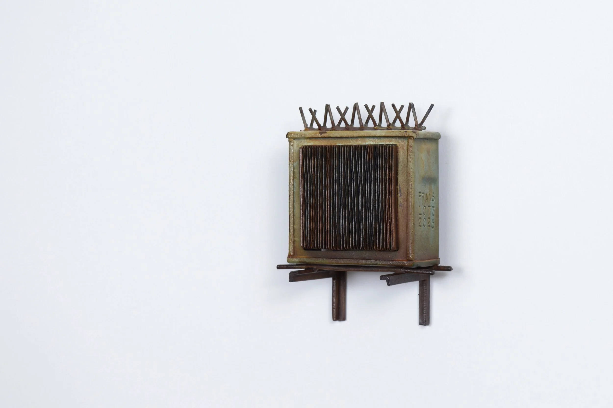 Frans Lotz, “Soupcan Talker”, painted steel with rust, 2025, 3 x 3.5 x 1.5 inches.
