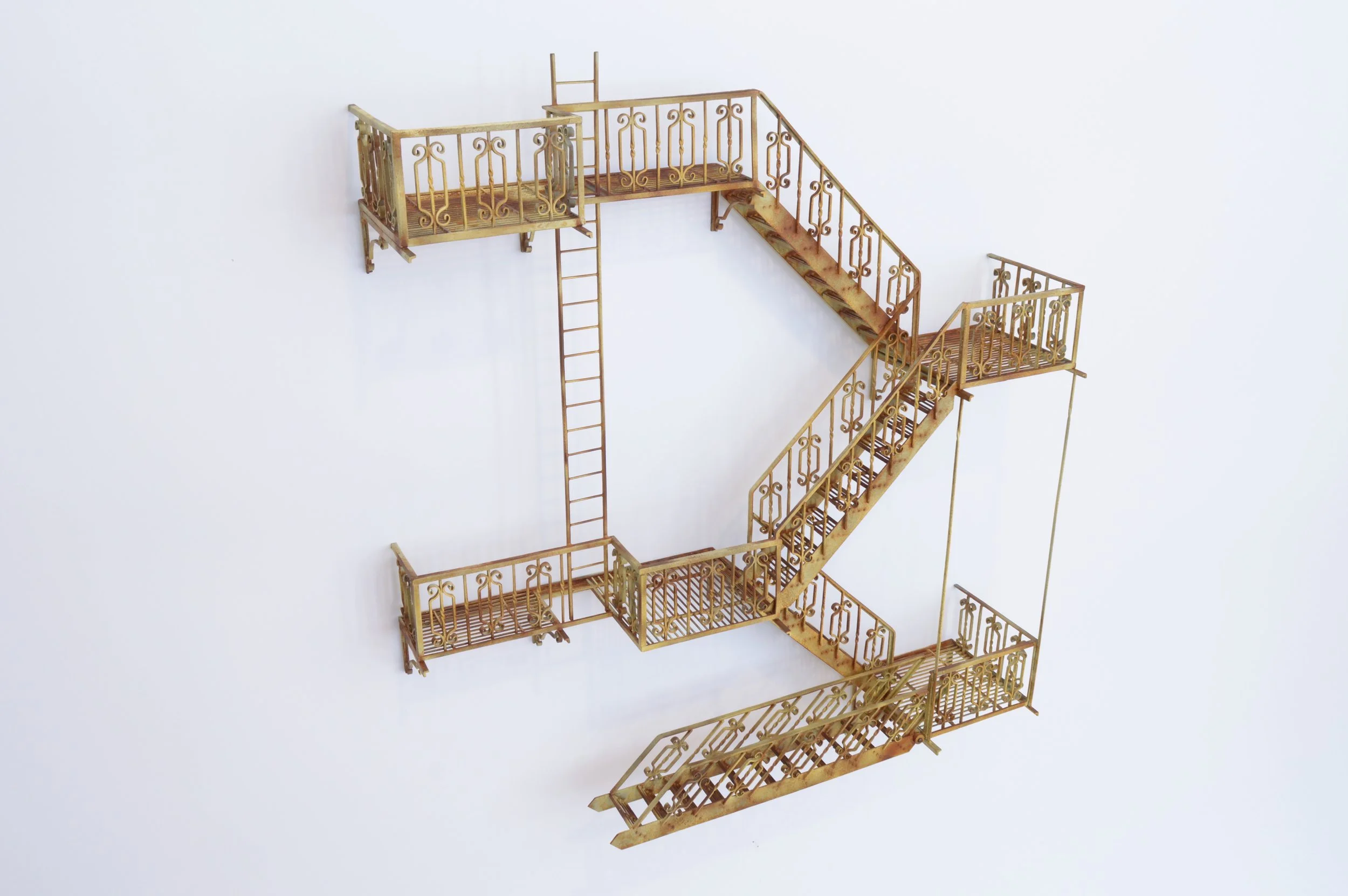  Frans Lotz, “Uptown Coldscroll”, painted steel with rust, 2025, 21 x 24 x 5 inches.  