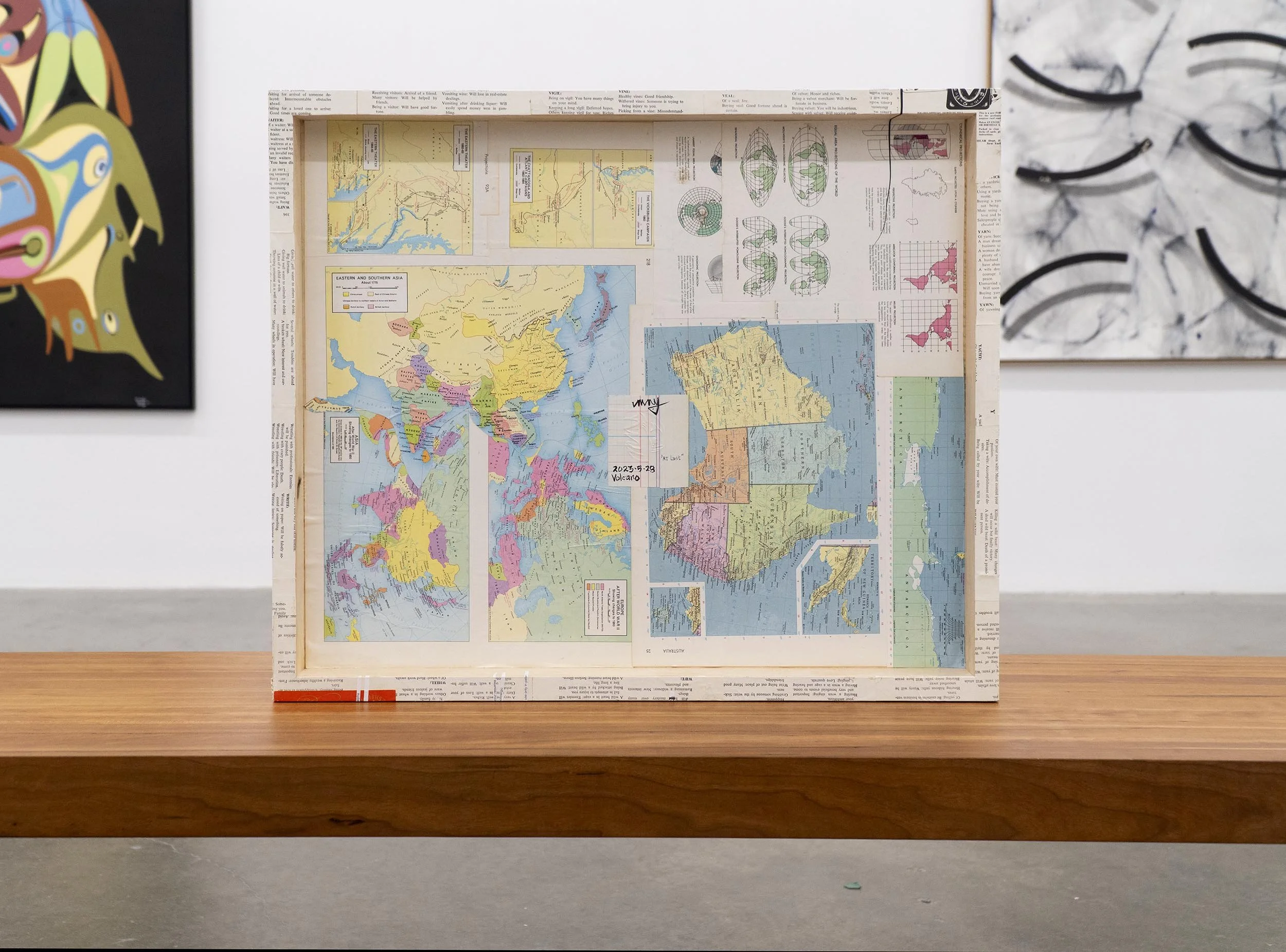  Yahgulanaas,  At Last (Volcano) , collage of historical ledger paper, historical maps, medical text, labels from historical catalogue, kozo washi/Japanese paper, acrylics, pencil crayon, and ink on birchwood support, 51 x 61 x 4 cm / 20 x 24 x 1.5 i