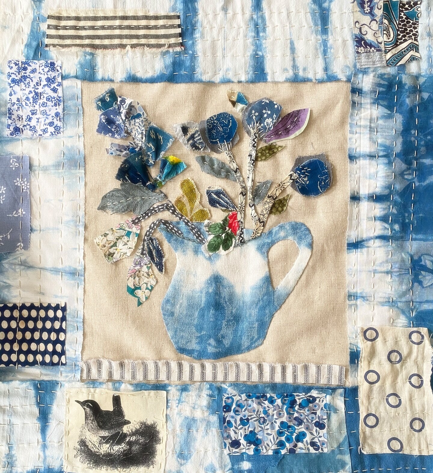 a variation on #myindigokitchen for a workshop this spring. love the way the indigo highlighted the damask pattern in the pitcher. #charlottelyonsstitching #textilecollage #indigo #slowstitching 🪡🧵