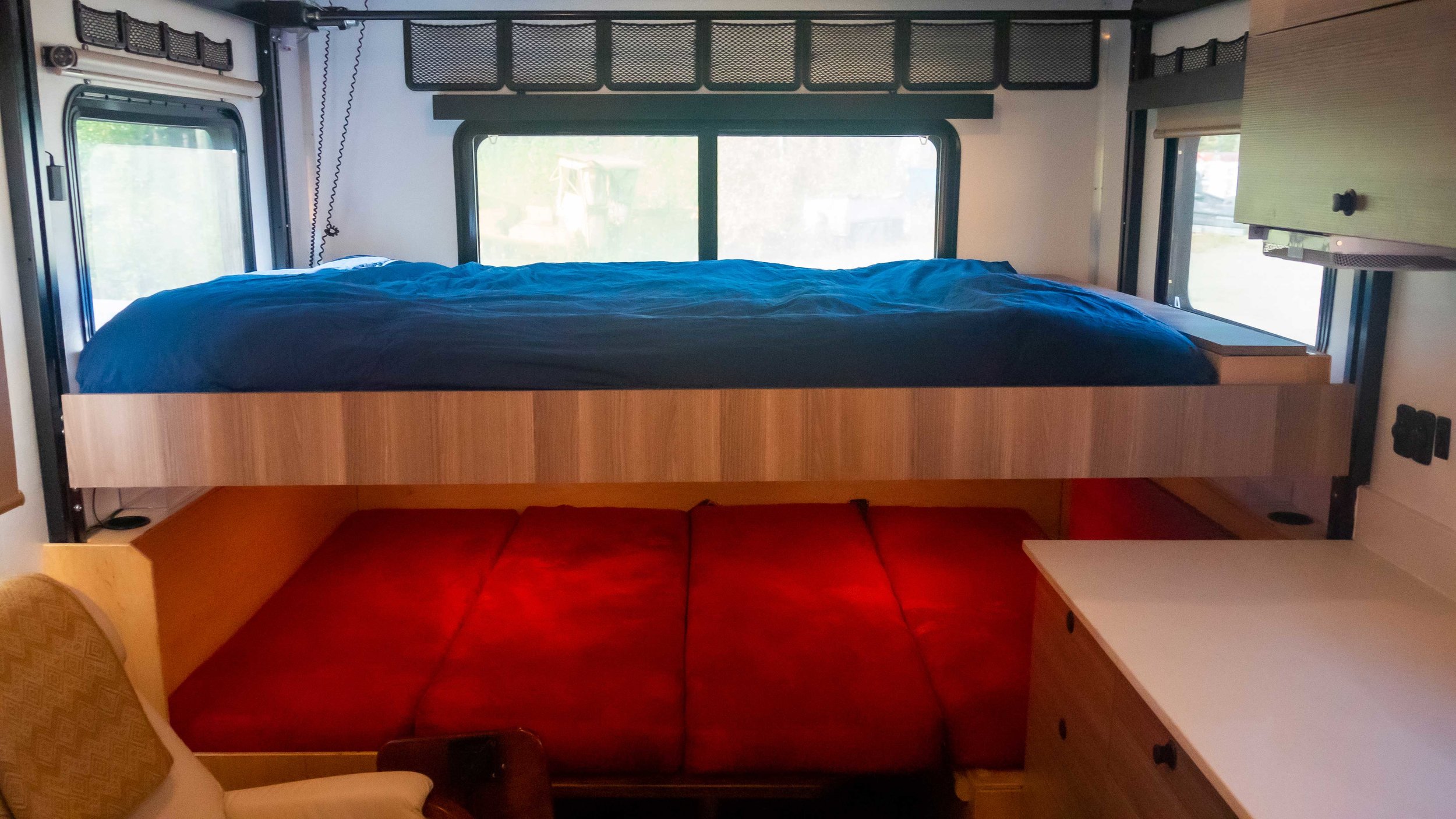 queen-sized bed descends over convertible dinette (sleeps 4)
