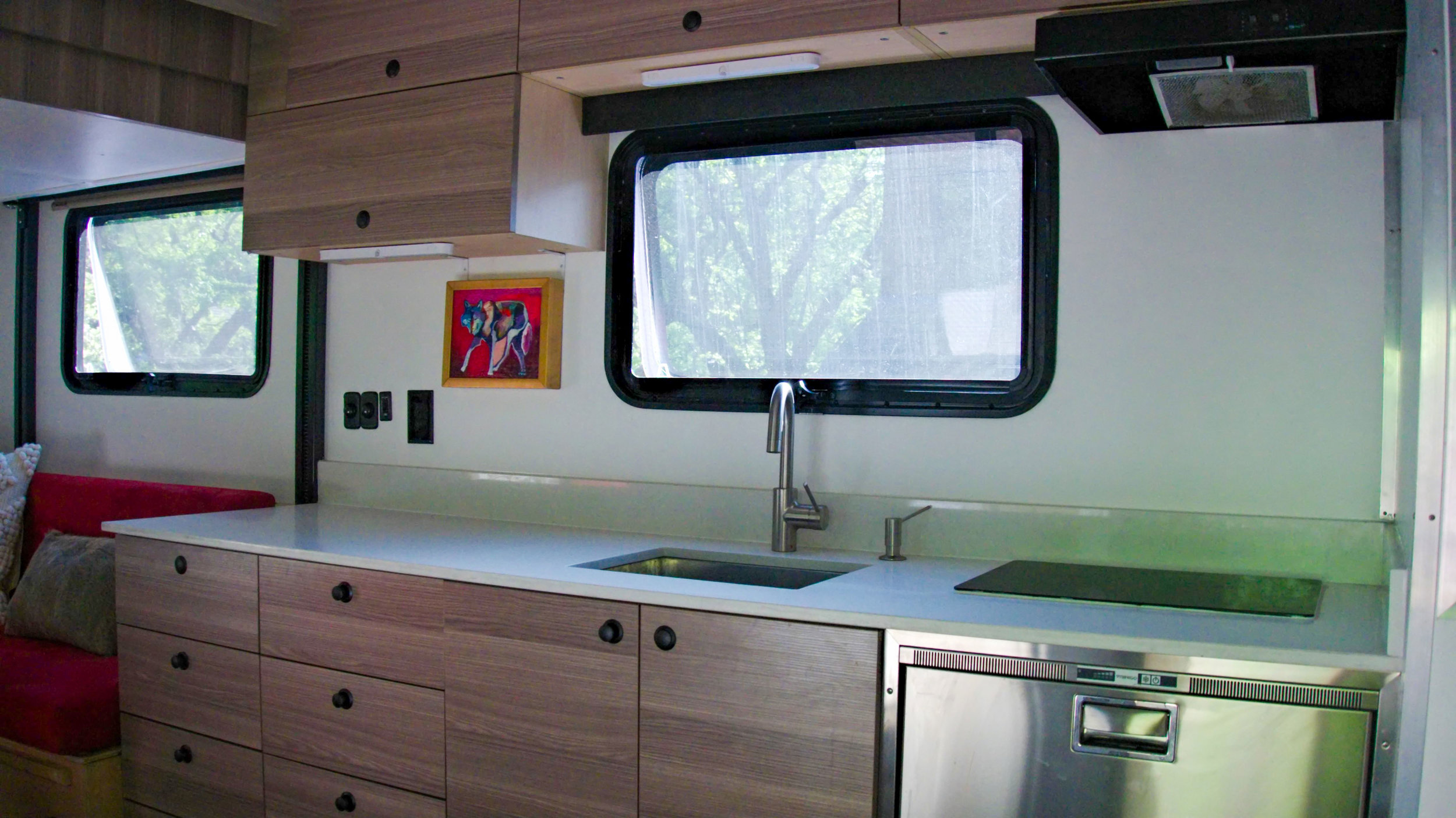 kitchen with dual burner induction stove & stainless steel sink
