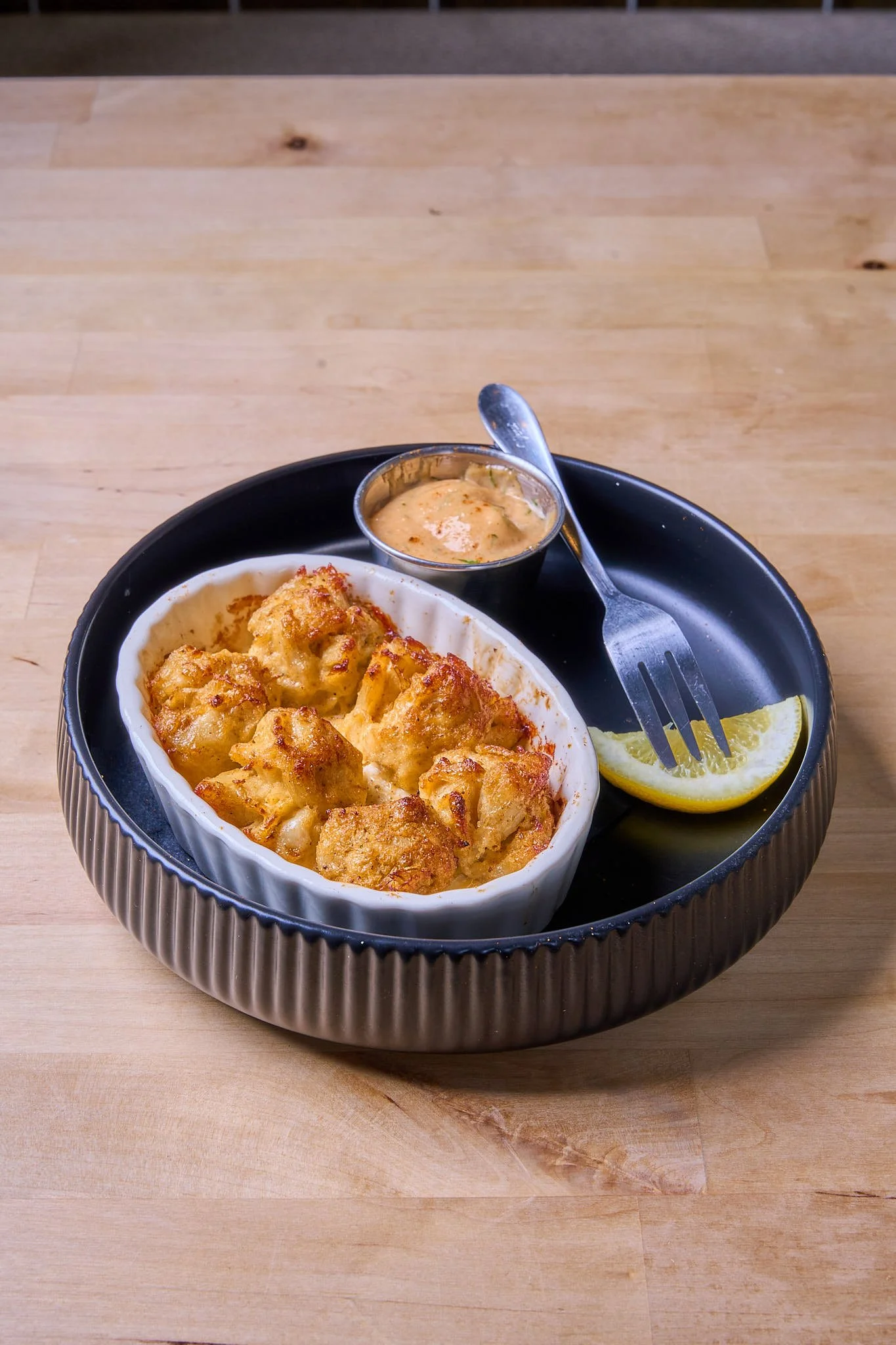 Hot and creamy signature Maryland crab dip served with lemon