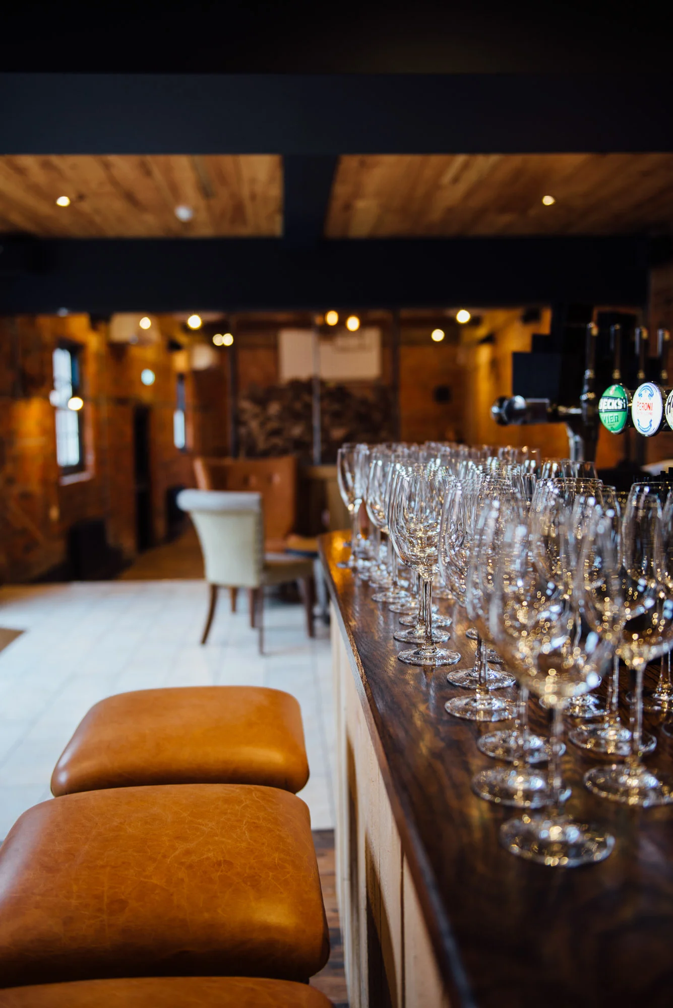FUNCTION_ROOM_THE_STABLES_BAR_SEATING_GLASSES_PORTRAIT_Web.jpg