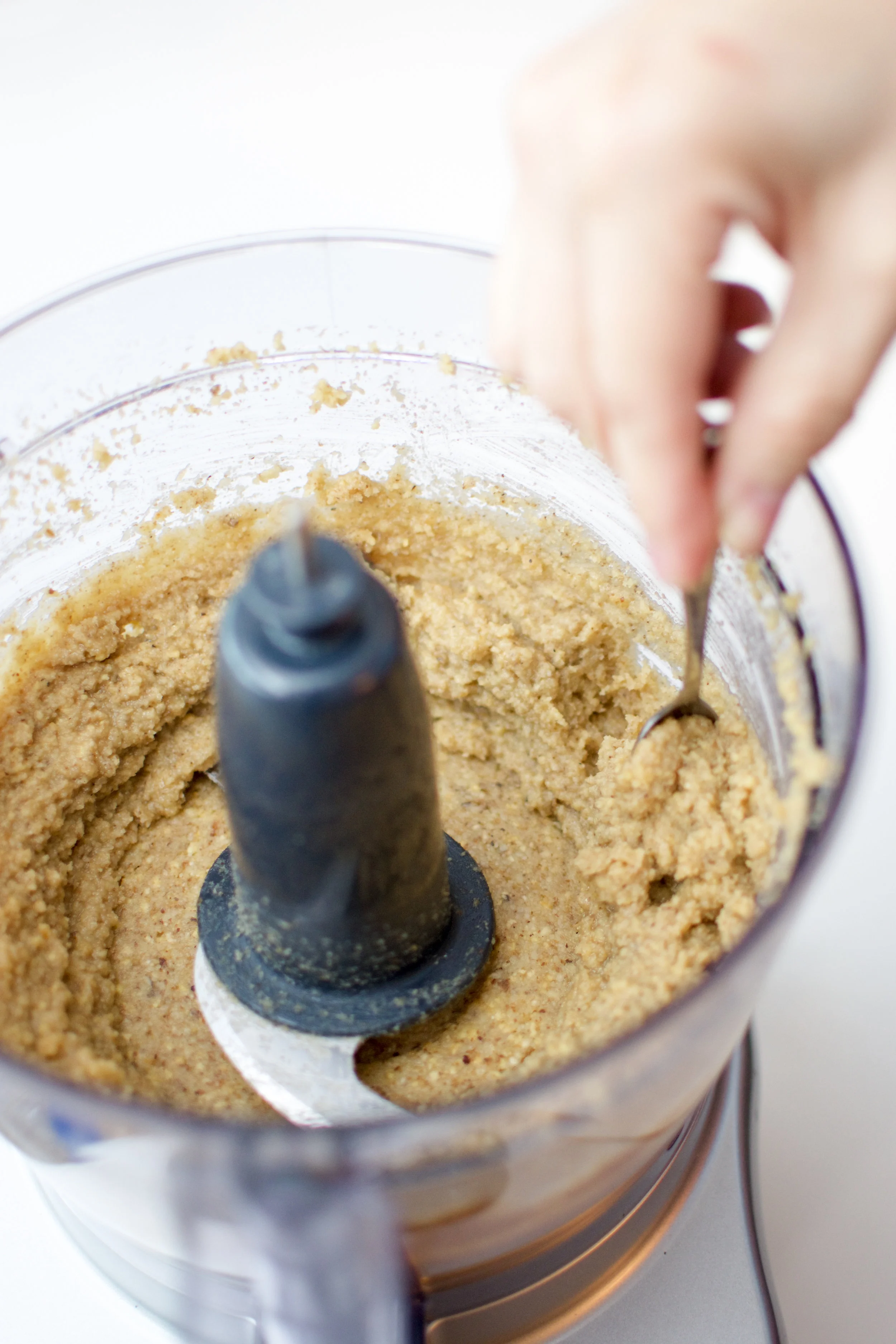 Continue processing until you reach your desired consistency, if needed, add the additional ¼ cup avocado oil to help blend. Scrape down the sides of your food processor every couple of minutes during the process. Add the cinnamon and salt, and process for another 30 – 45 seconds.