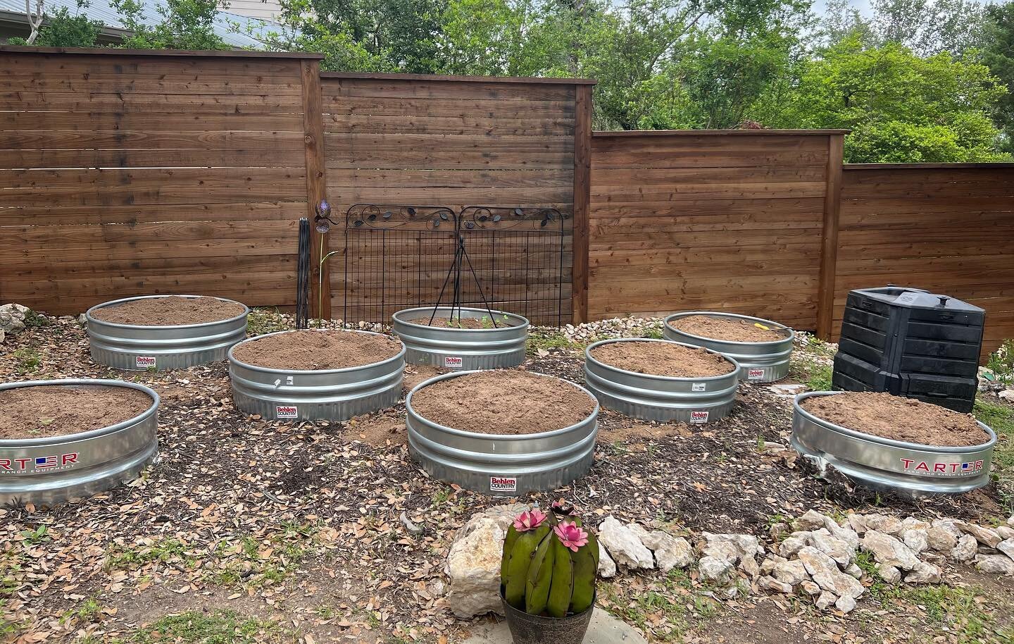 EARTH DAY! 🌎 
I don&rsquo;t have a green thumb (Wild understatement) but I&rsquo;m not giving up. We have our new barrels filled with dirt and seeds planted. 
On the right is our veggie compost bin where our worms are working hard. 
You may have hea