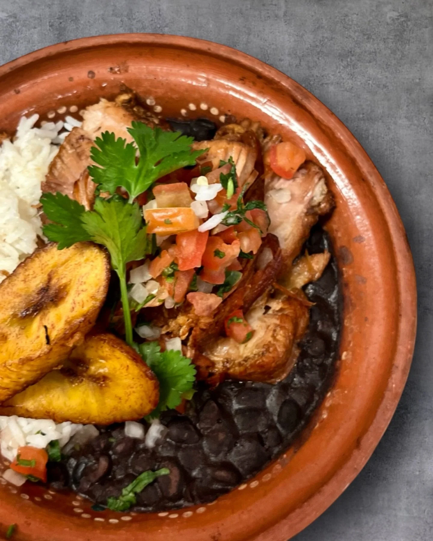 Carnitas done right. 🔥

Tender, slow-cooked pork piled high with all the essentials: creamy black beans, sweet caramelized plantains, fluffy white rice, and fresh pico de gallo. Every bite hits different at Zona Rosa.

Come spend the weekend with us