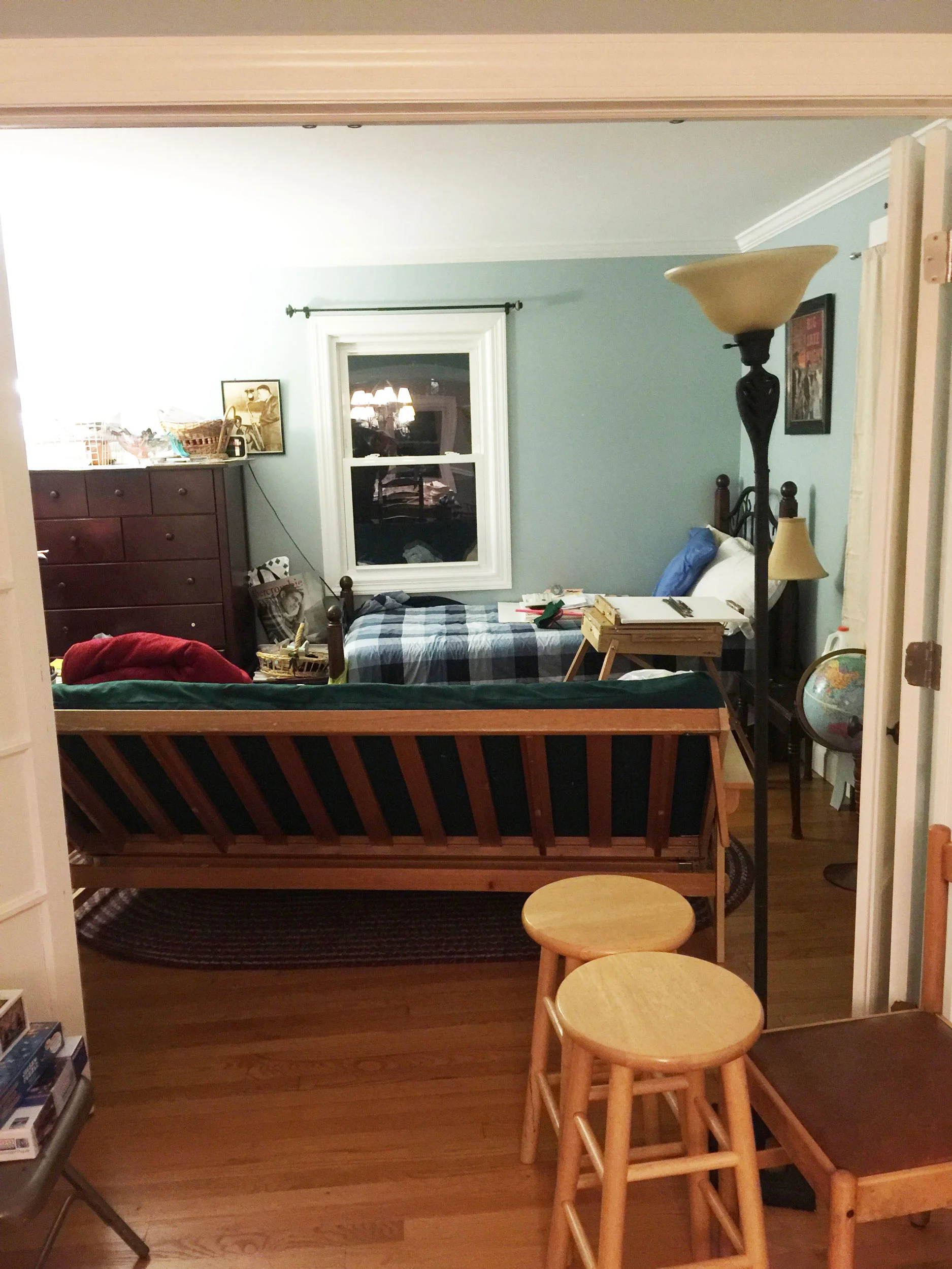 This guest room already had french doors leading into the dining room. A perfect place to add the wet bar and sofa and chairs.