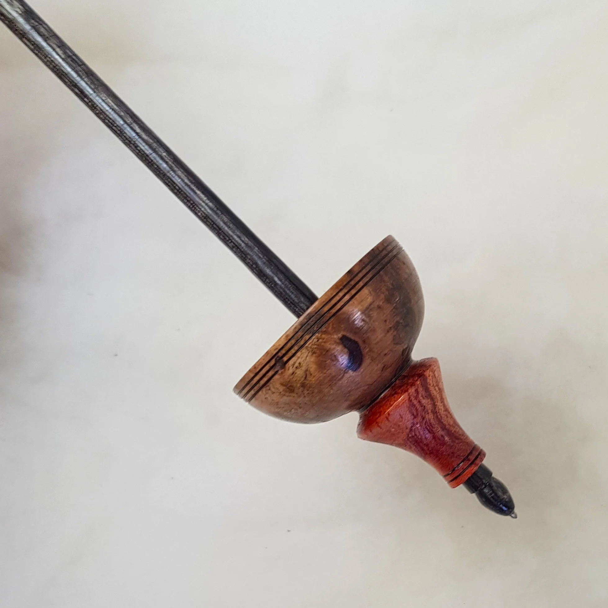 Signature Series - Tibetan - Light Weight Titanium Tipped Supported Spindle in Highly Figured Ebony Burl, Highly Figured Sorren Wood, and Frogwood.