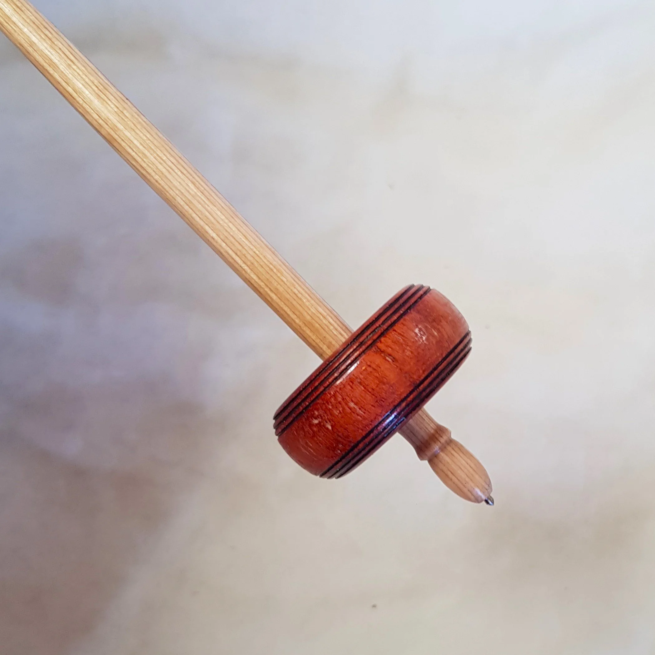 Signature Series : Tahkli style support spindle, light weight, titanium tipped in Brazilian Pepperwood, and Frogwood.