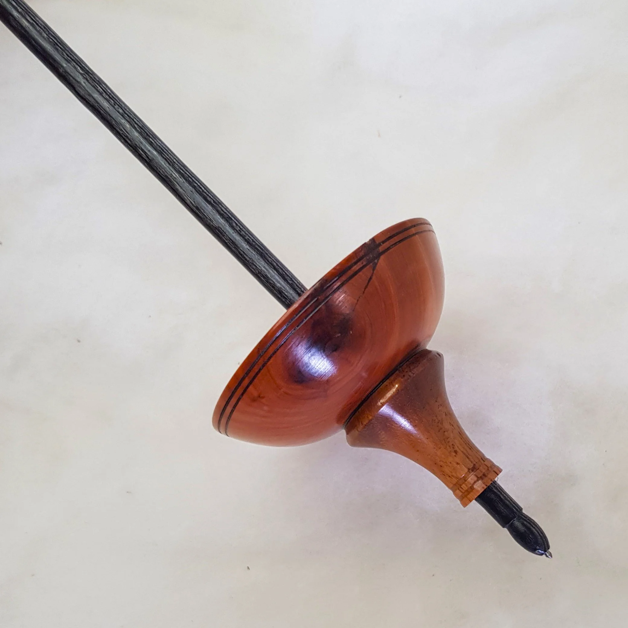 Signature Series - Pu Yok - Light Weight, Tibetan Style Supported Spindle in Figured Huon Pine, PNG Red Rosewood, and Frogwood.