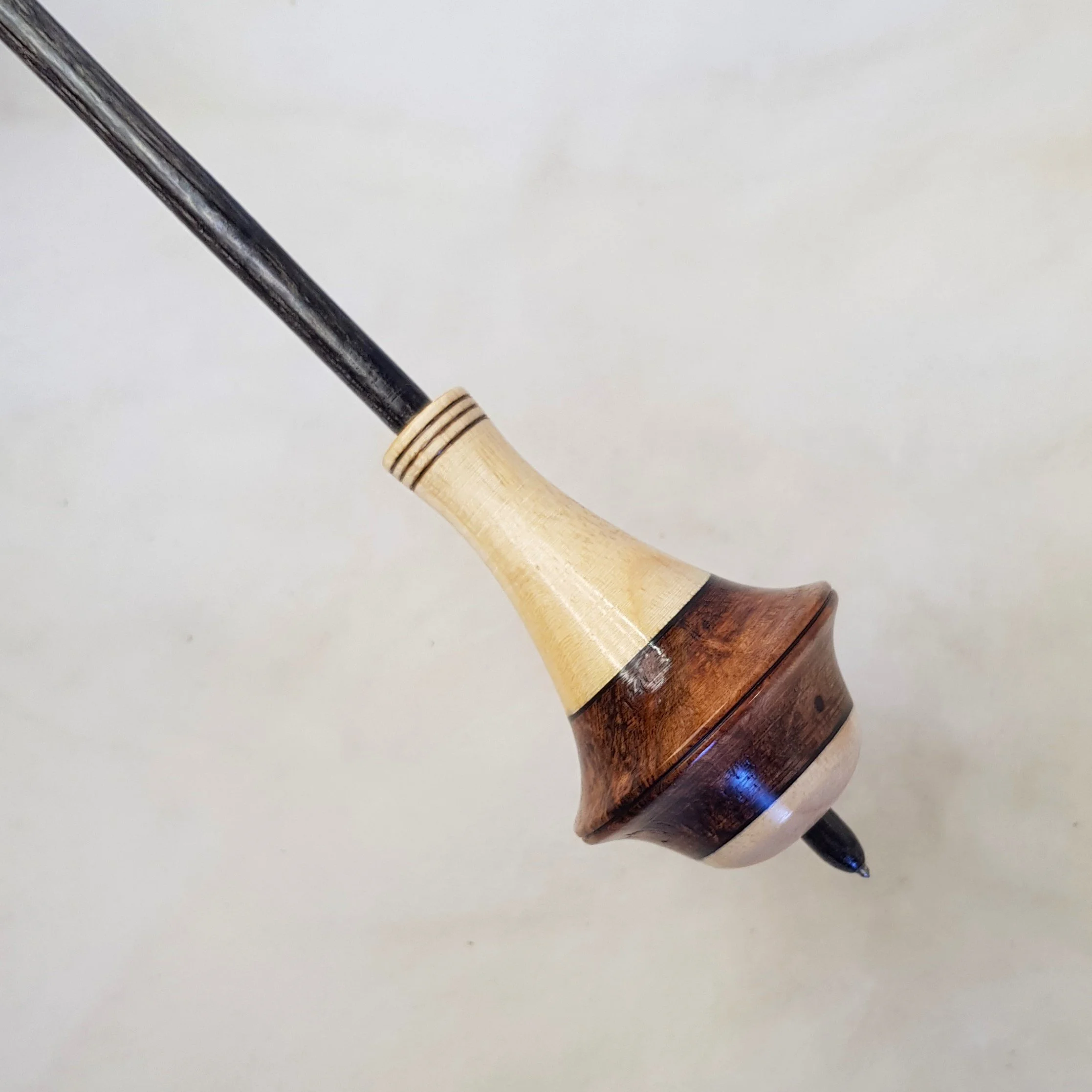 Signature Series - Dyavol - Medium Weight, Russian Style Supported Spindle in Very Highly Figured Ebony Burl, Figured Quandong, and Frogwood.