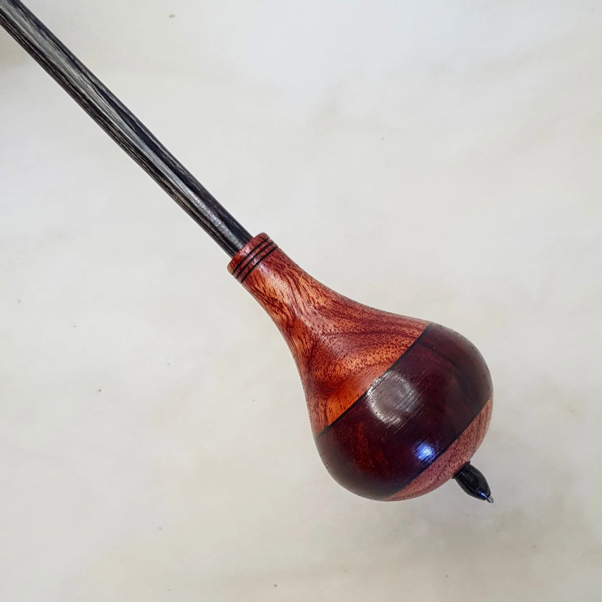 Signature Series - Teardrop -  Medium Heavy Weight Russian style supported spindle in Highly Figured Jarrah,  Curly  Suren Wood, and Frogwood.