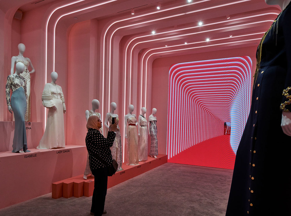 A model holding a Louis Vuitton bag stands in front of an artistic  installation during an exhibition inside the French Pavilion in the Expo  site in Sh Stock Photo - Alamy