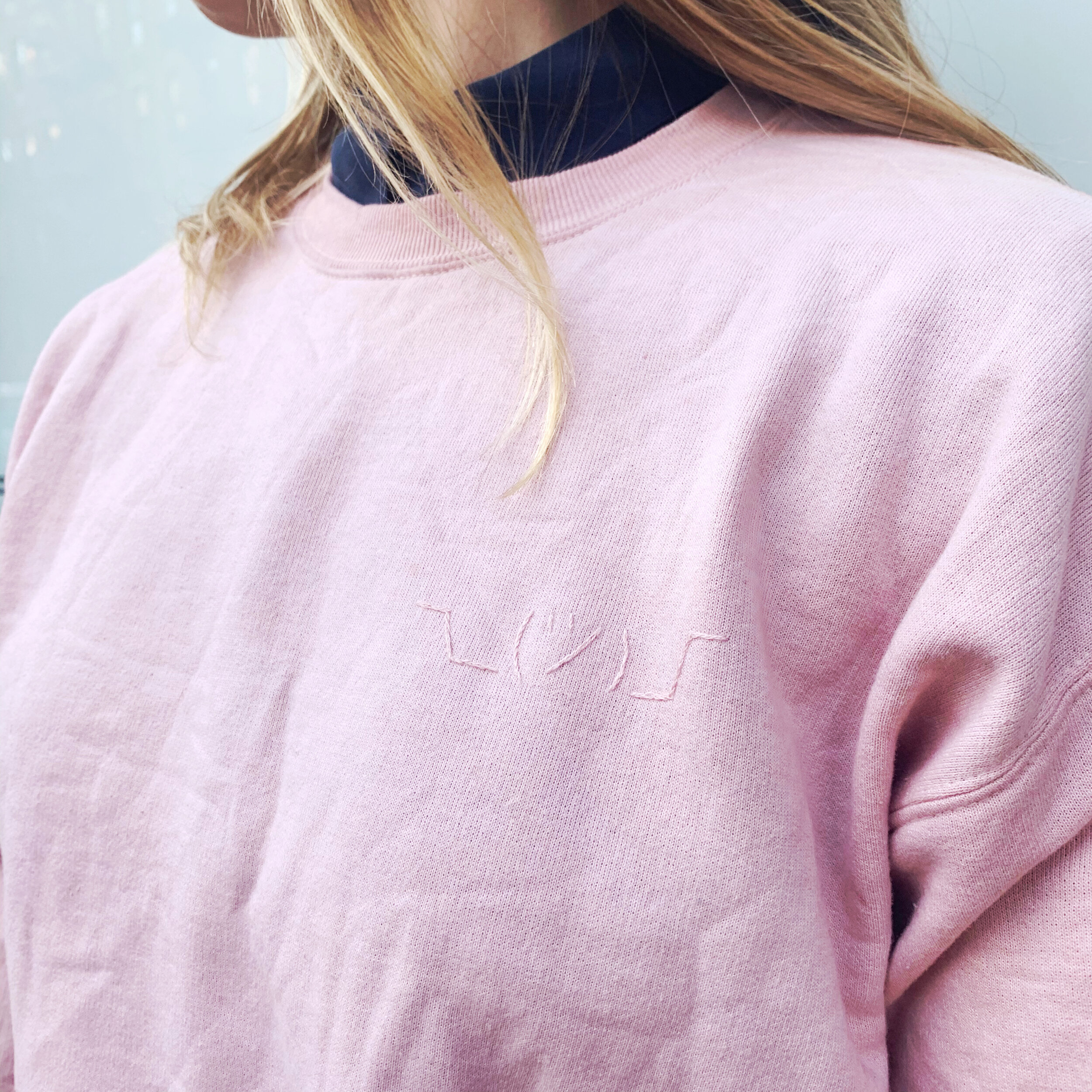 shrug crewneck sweatshirt