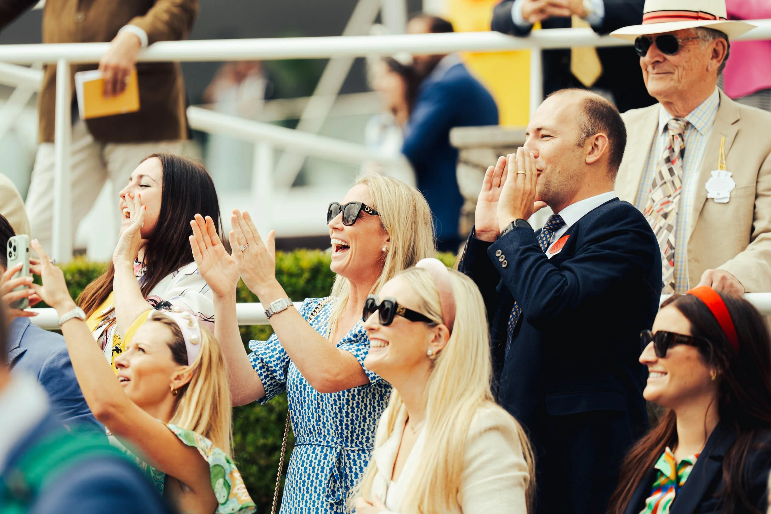  Crowd cheering at the 2023 Qatar Goodwood races, taking place at the Goodwood Racecourse Chichester, West Sussex. 