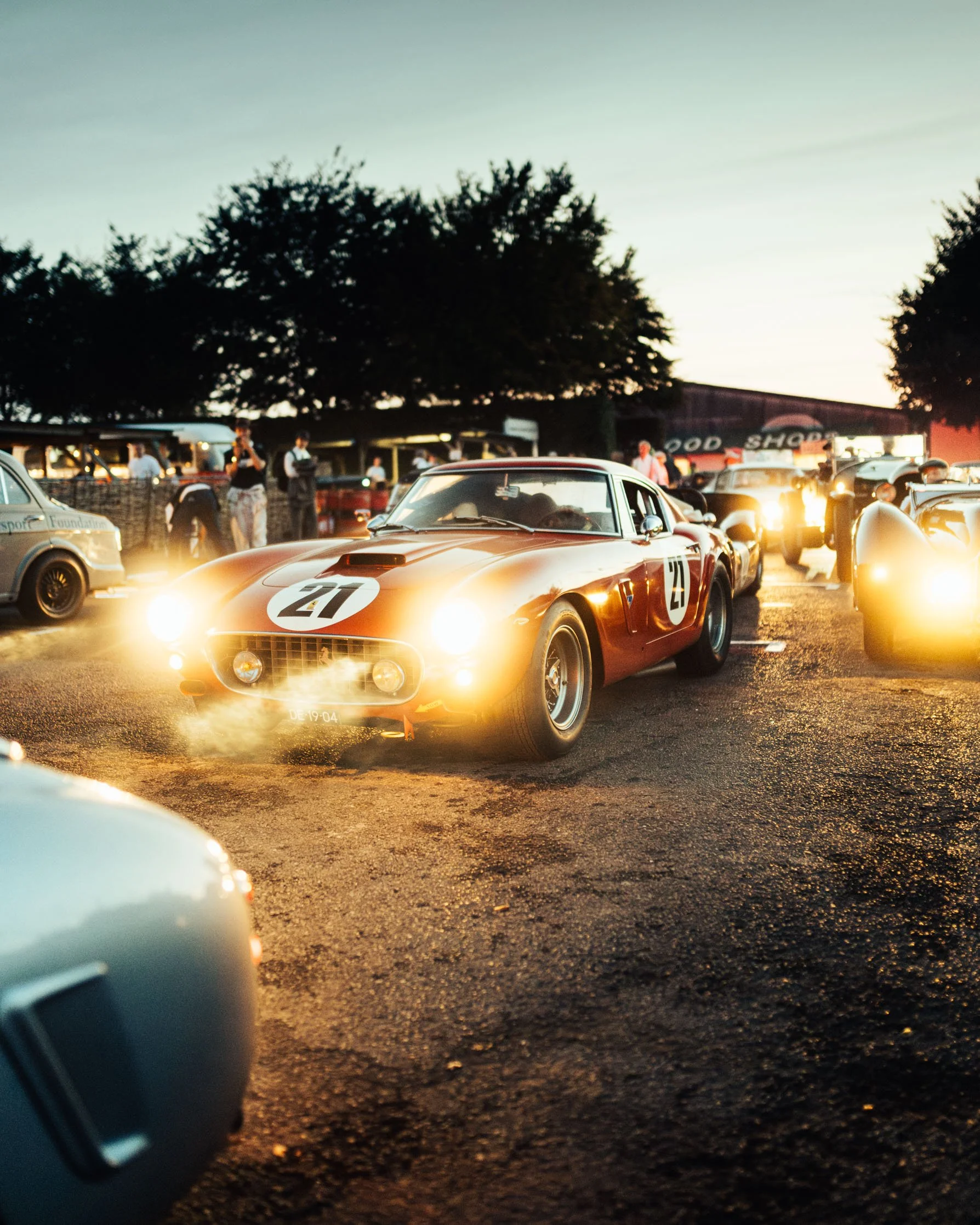  The No. 21 Ferrari 250 GT SWB of Alexander van der Lof shot at dusk on Sunday at the Goodwood Revival event taking place at the Goodwood Goodwood Motor Circuit Chichester, West Sussex. 