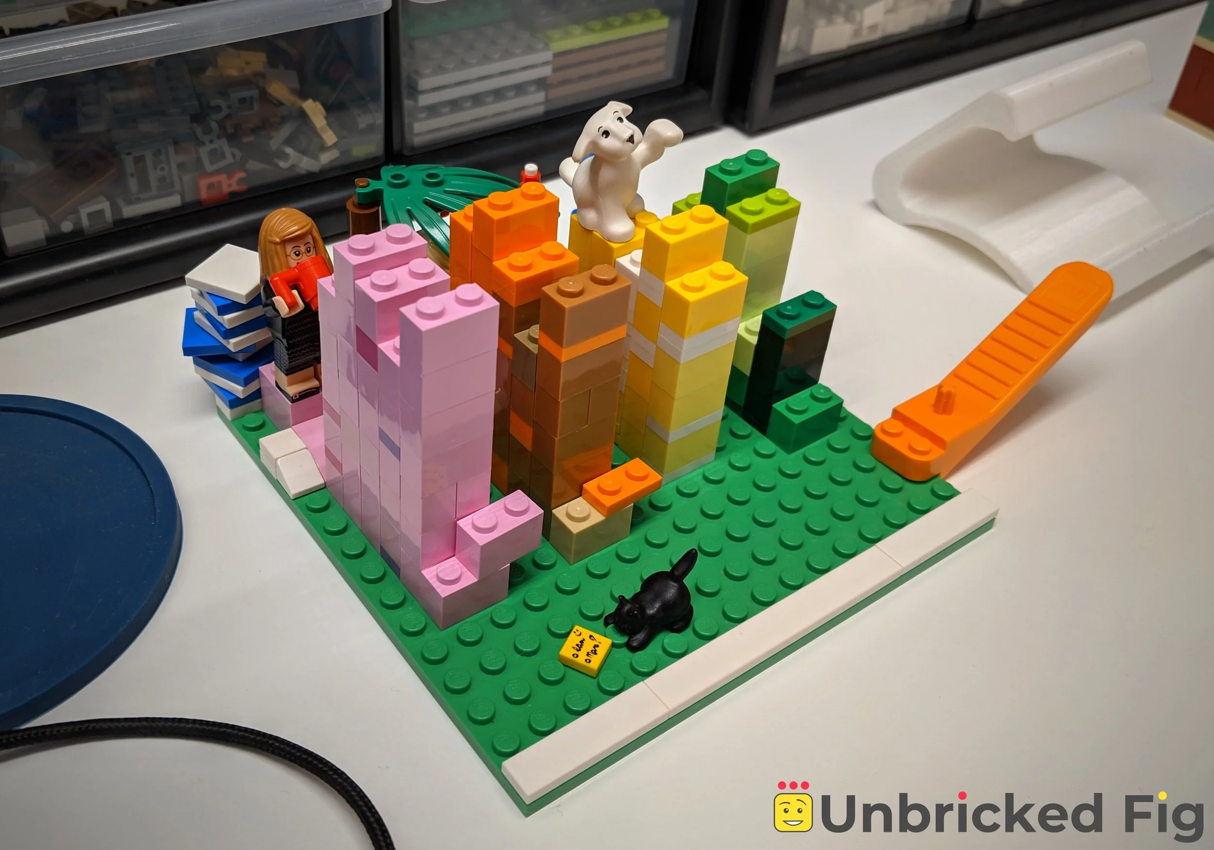 My brick habit tracker system in its natural environment – my messy desk – in week six of the experiment.