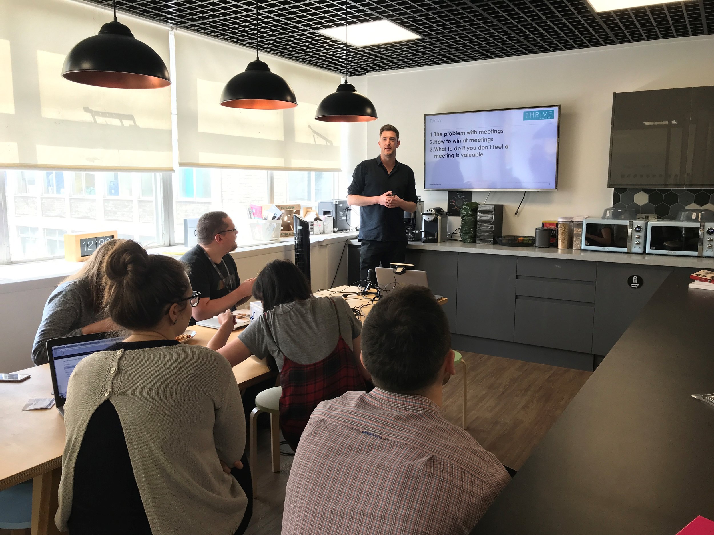 Onboarding clients at a lunch & learn session (2018)