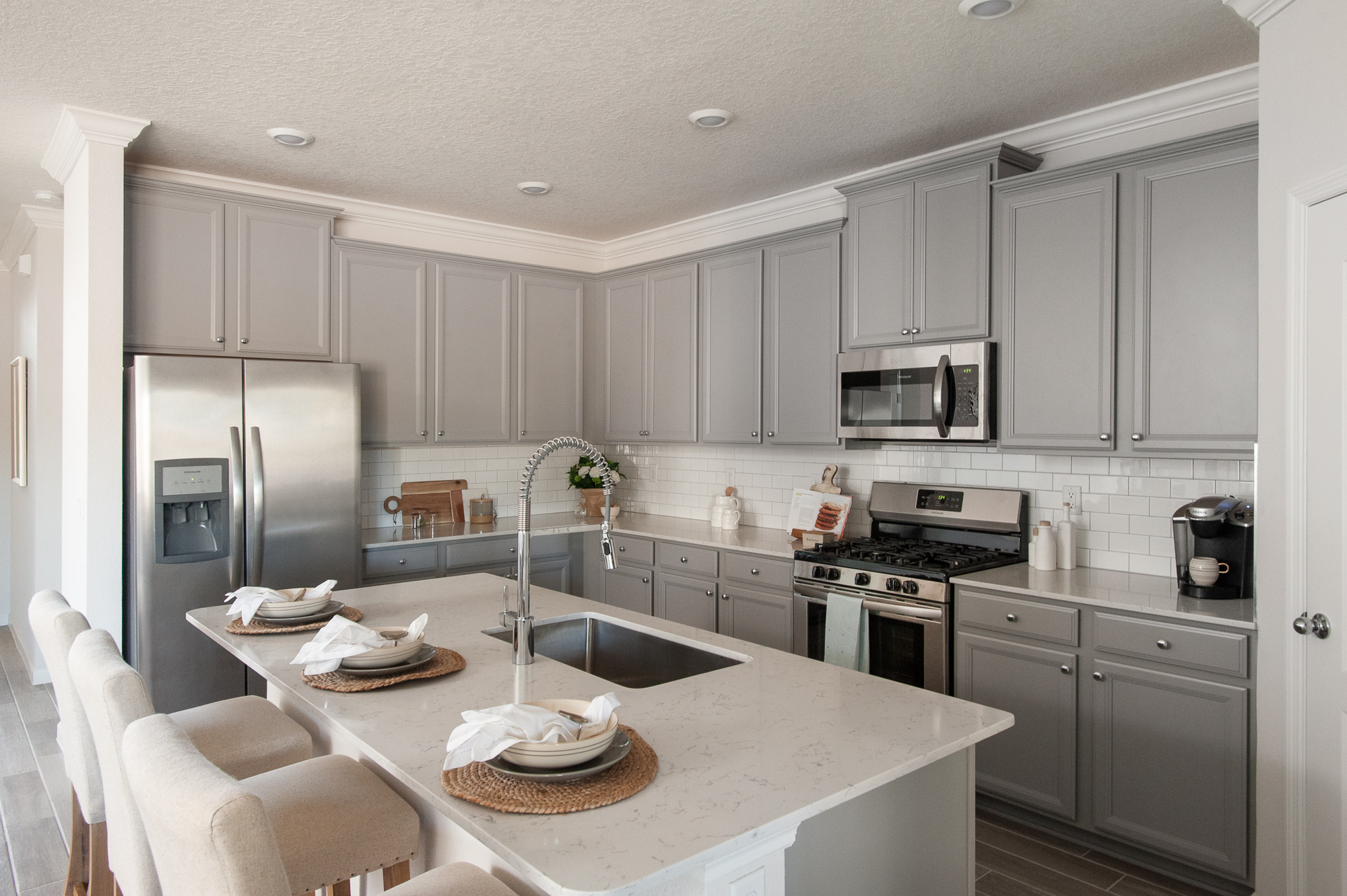 Micamy_Interior Designer_Design_Interior_Model_Merchandising_Kitchen_Grey_Cabinets_Forty West_Lennar_Place Setting_SubwayTile_Farmhouse.jpg