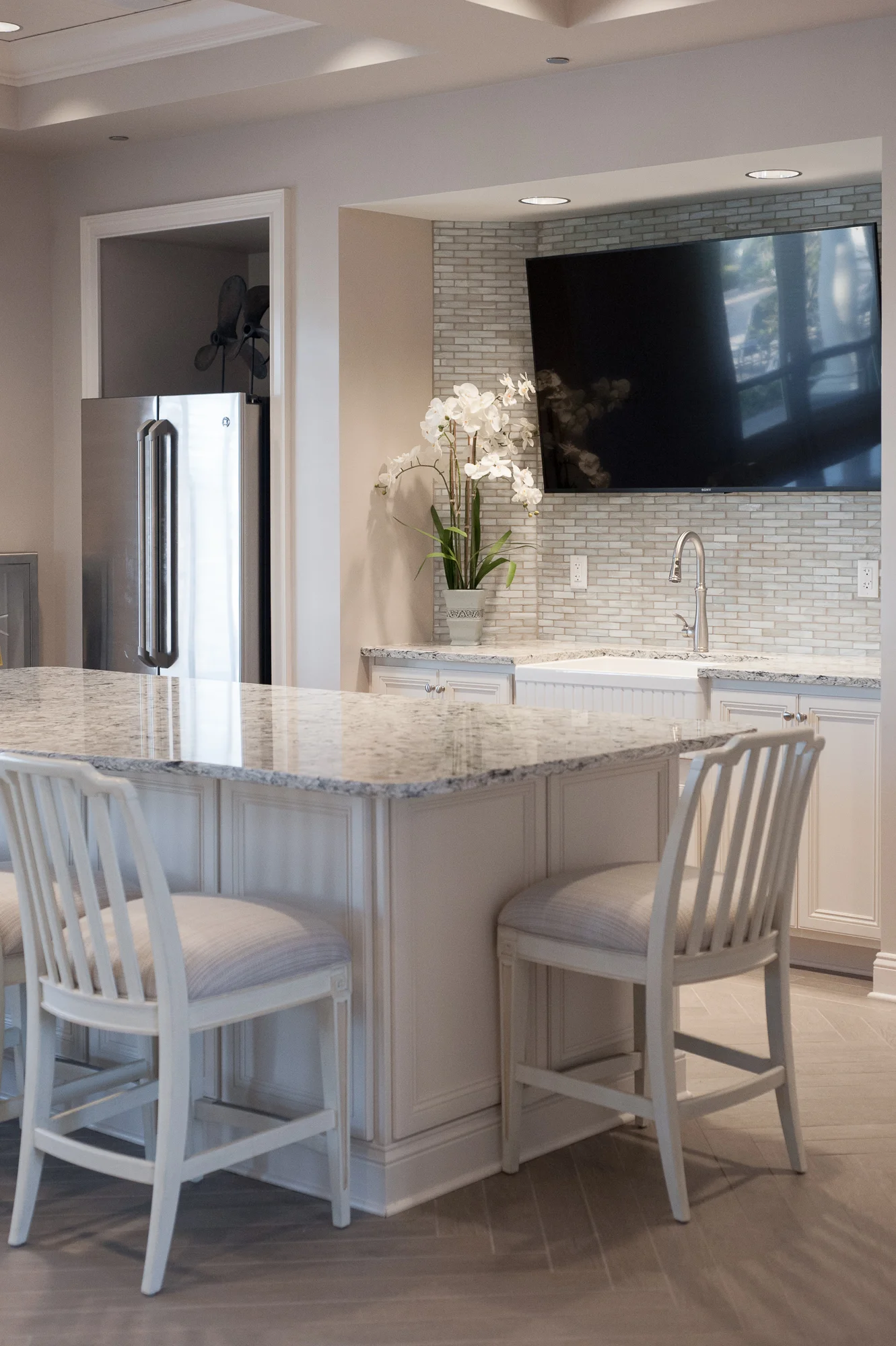 Micamy_Design_Studio_Interior_Design_Markland_StAugustine_Clubhouse_OldFlorida_Coastal_Glass_Mosaic_Tile_Backsplash_Kitchen_Cambria_Kohler_Blue_ (4).jpg