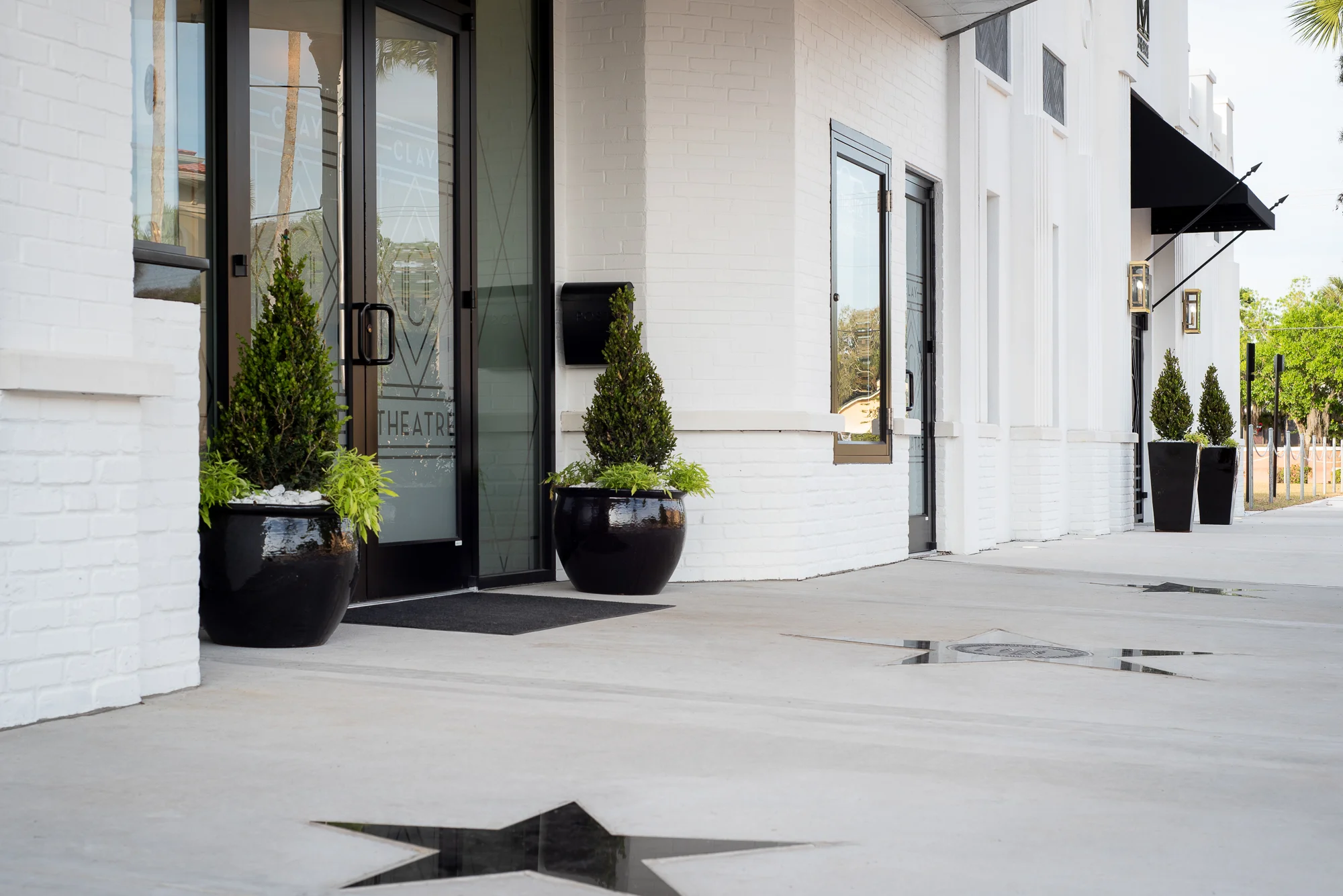 Micamy Design Studio_Interior Design_Clay Theatre_Event Space_Venue_Wedding_Art Deco_Modern_Historic_Renovation_Exterior_Front Door_Ticket Window_Star.jpg