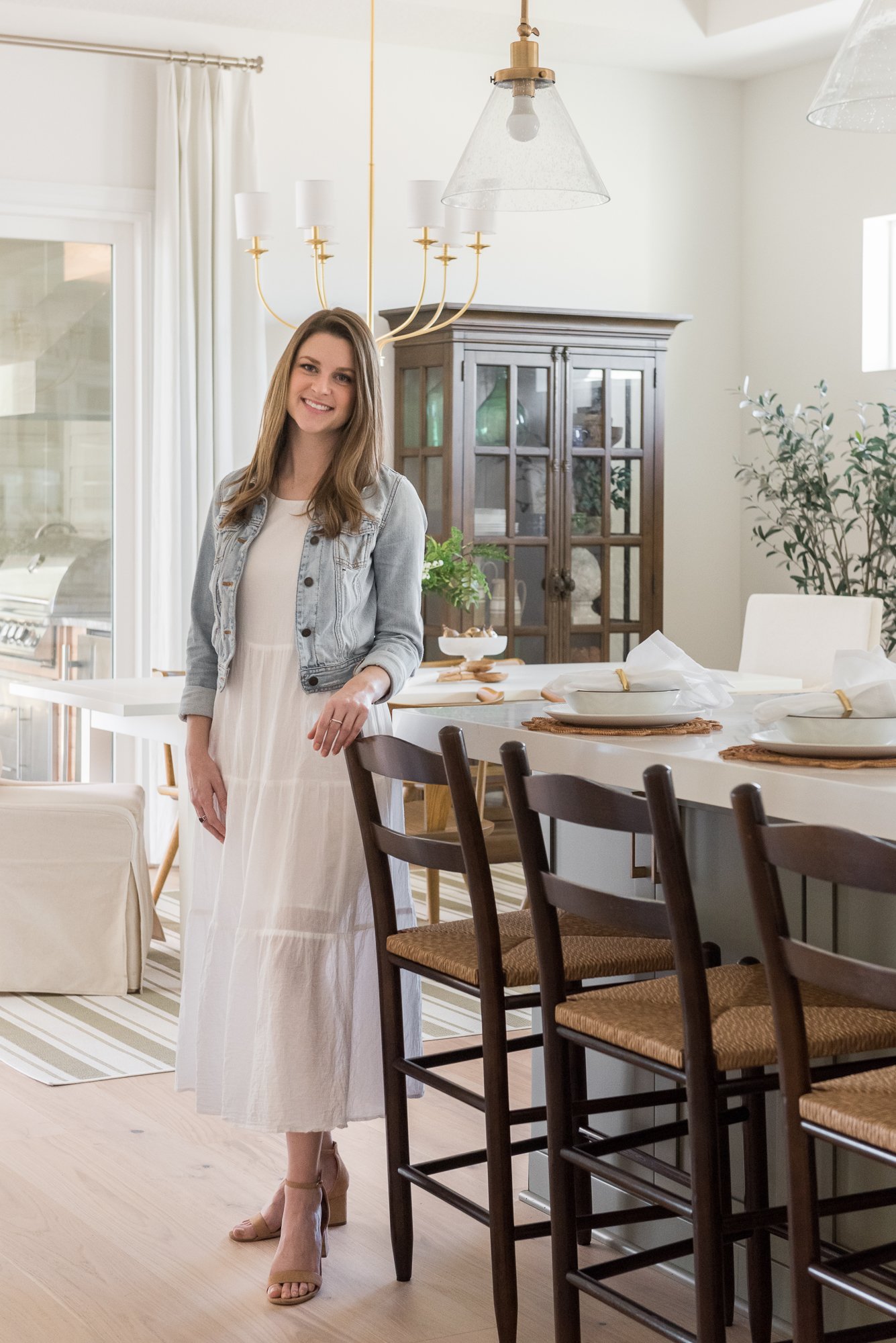 Grand Acadia Model_Dostie Homes_Micamy Design Studio_Model Home_Kitchen_Two Islands in Kitchen_Green Island Kitchen_Wicker Stool_Lifestyl.jpg
