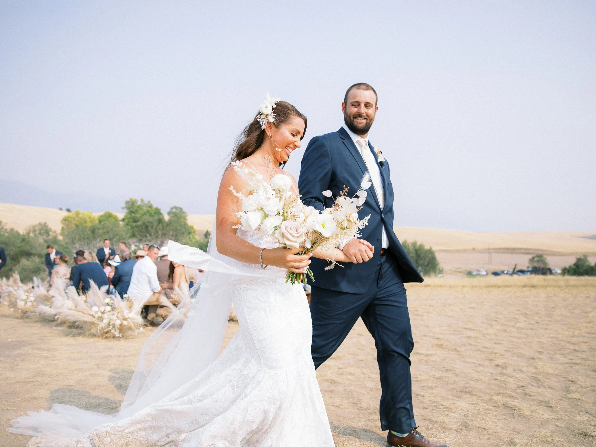 A bride and groom during their walk back down the aisle after getting married
