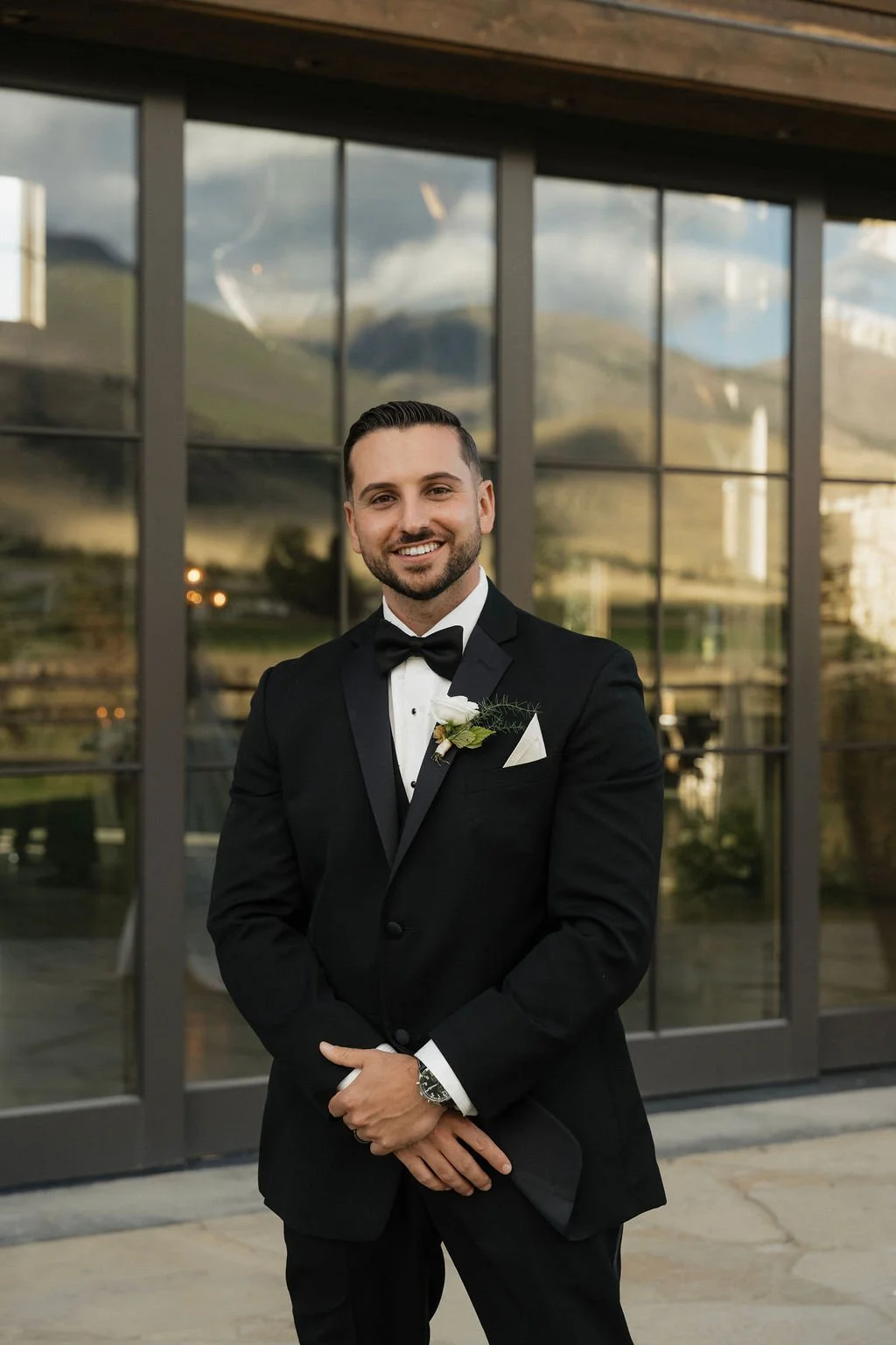 the groom with his boutonniere