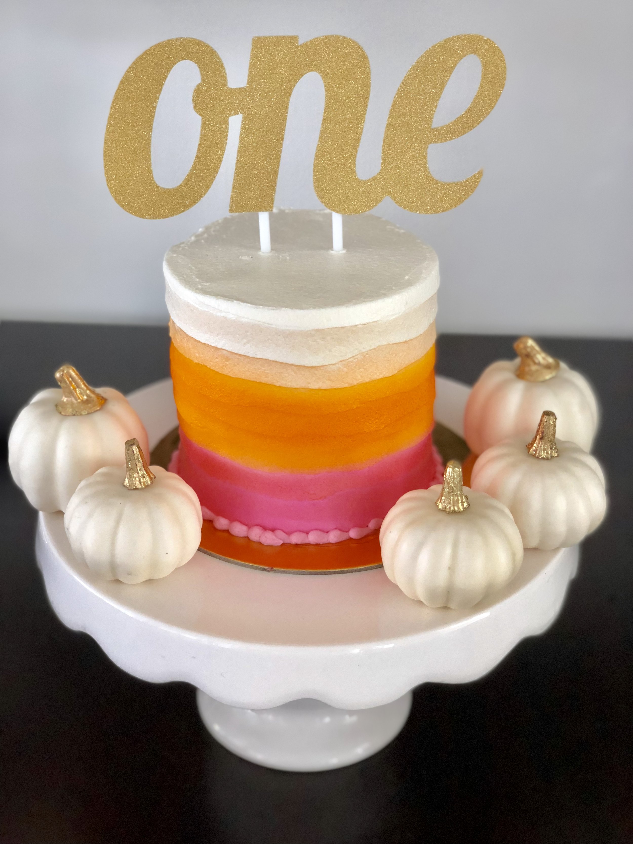 ombre pink and orange smash cake.jpg