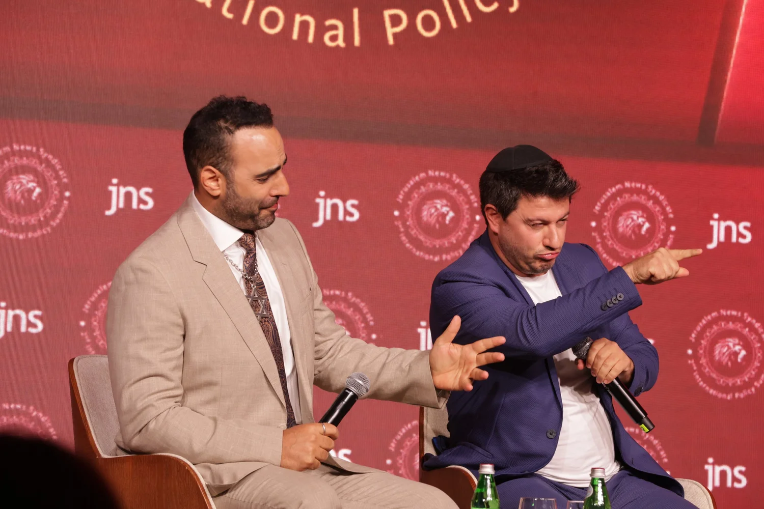 Ami Kozak speaking at an event