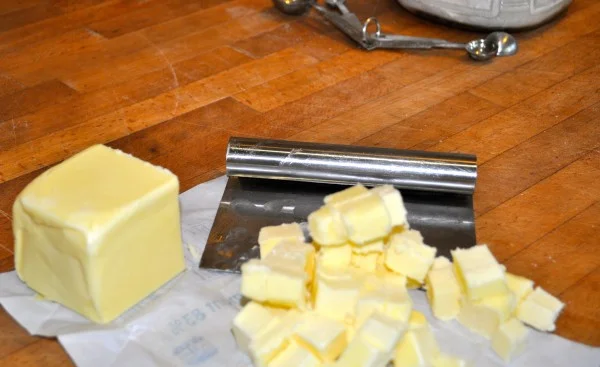 Cutting the butter.