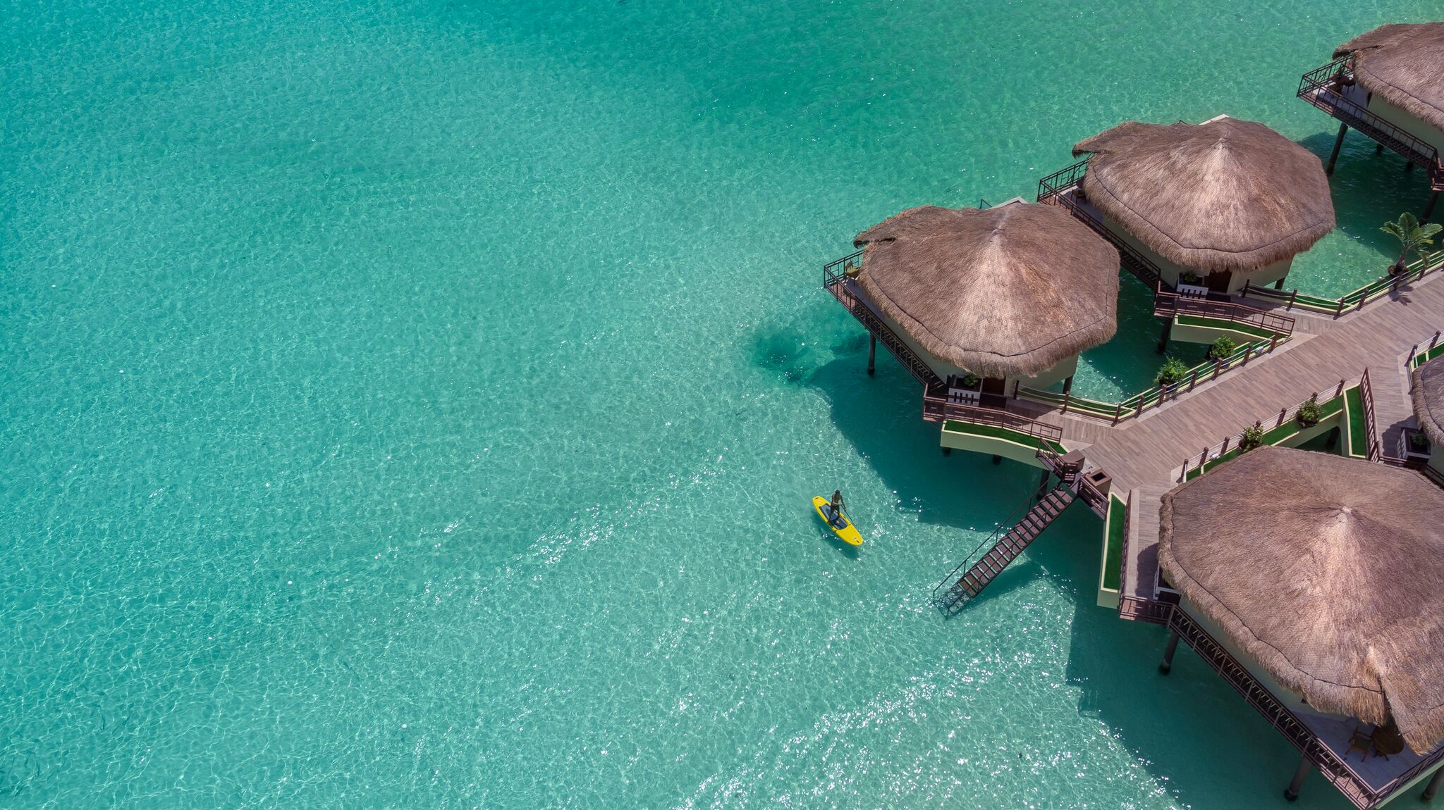 Palafitos_Overhead_Paddleboarder.jpg