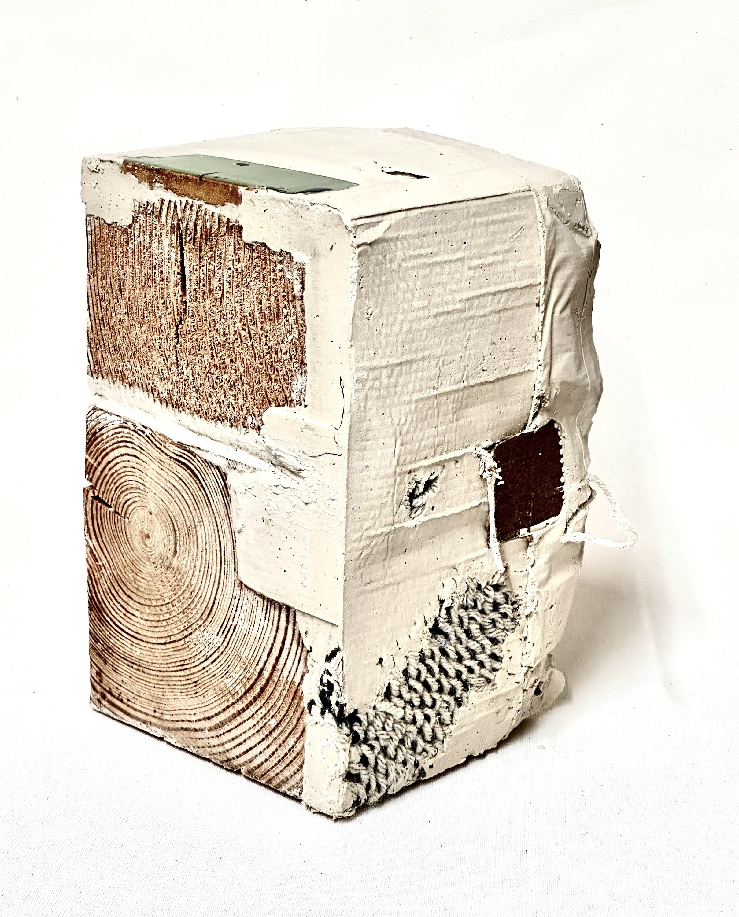 Bird's Eye Formation (View 2).  Plaster, wood blocks, weaving on honeycomb packing paper, cardboard, clay tile.  12"h x 7"w x 7"d.  2026