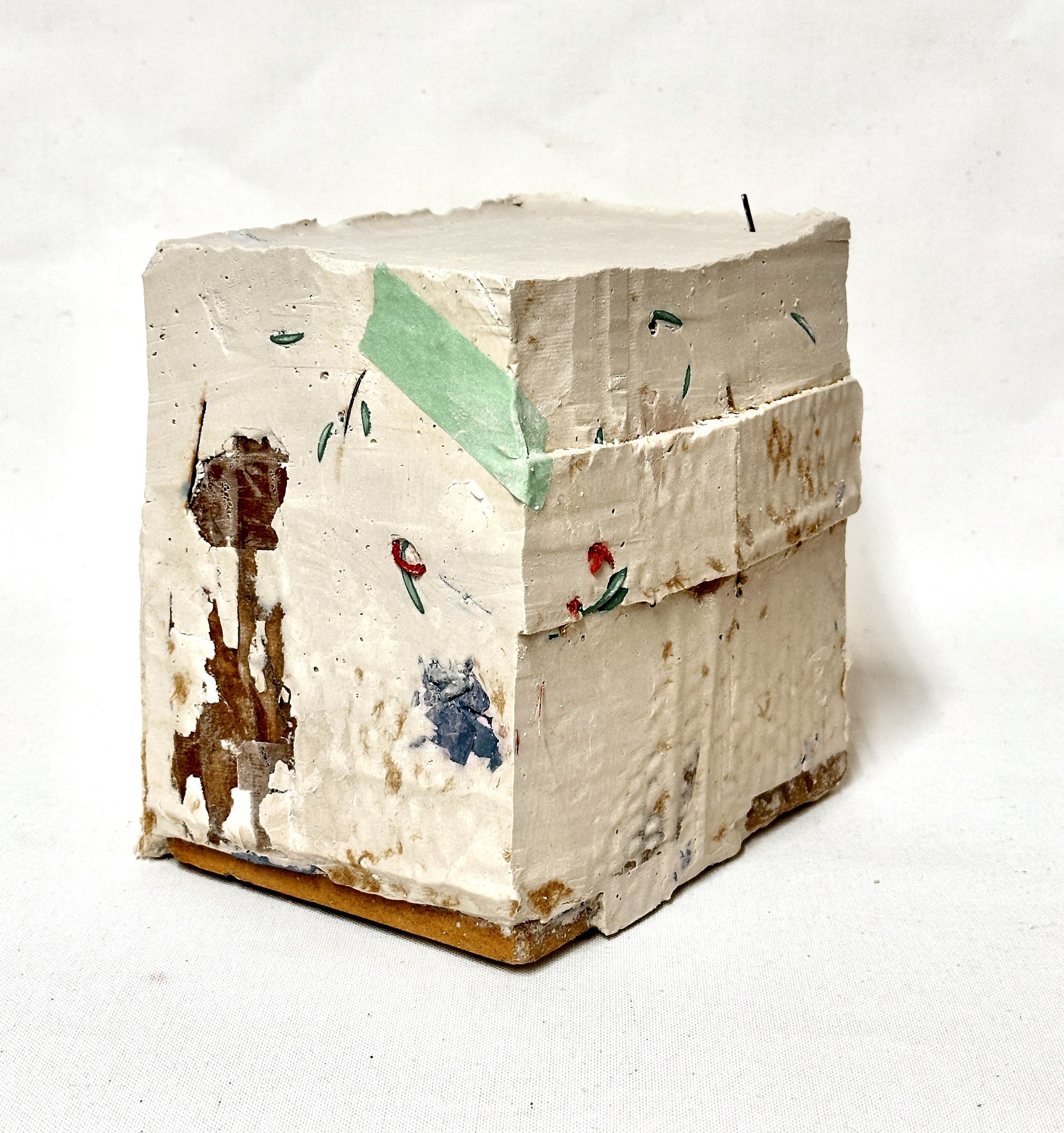 Present.  Plaster, yarn weaving on packing paper, clay tile, cardboard, tape, thread, metal rod, customs shipping label.  8"h x 10"w x 6"d.  2026