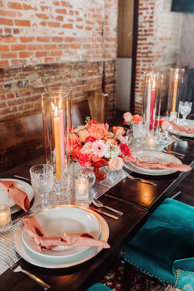 A Timekeeper banquet table is decorated in pink and silver for a wedding.