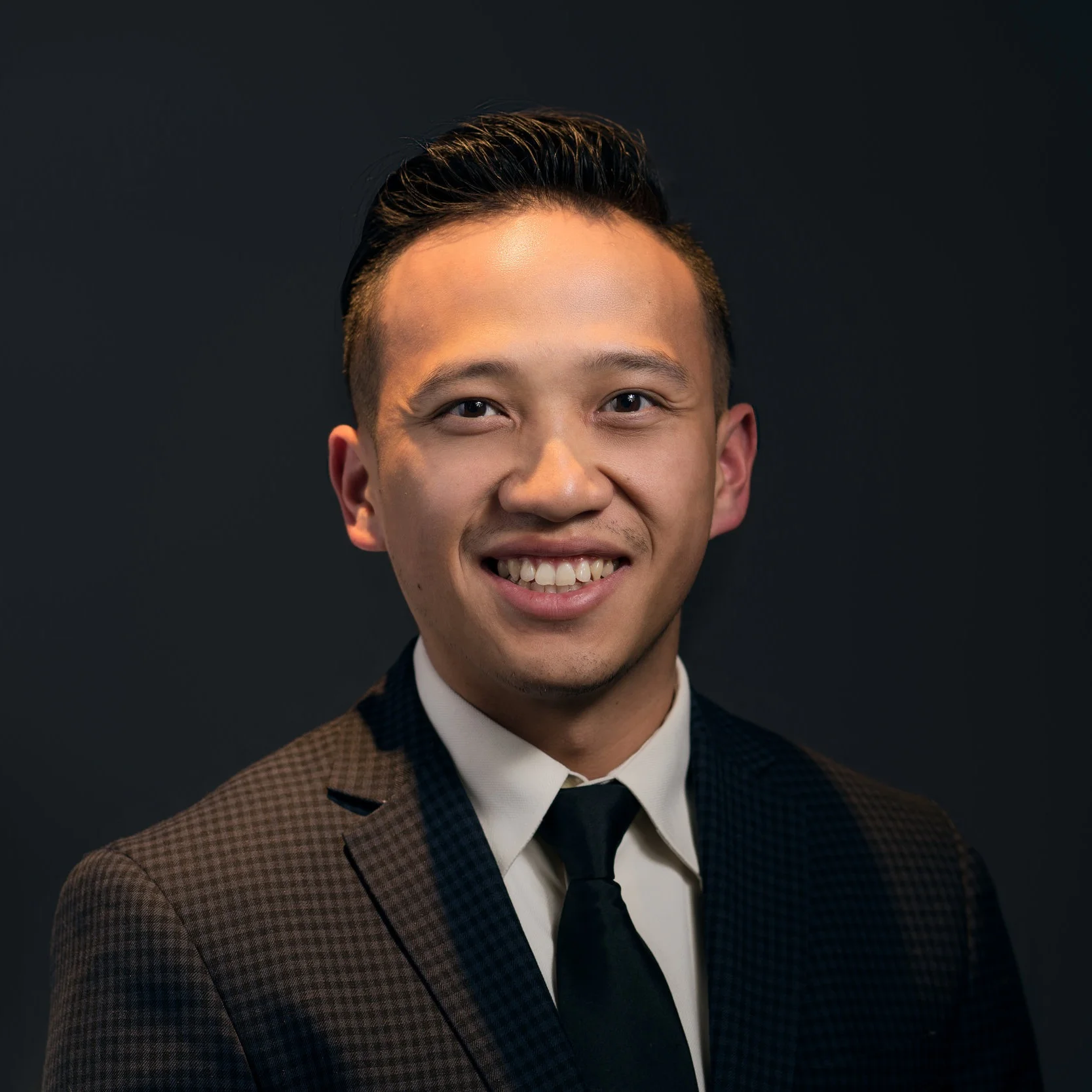 Travis Kiatoukaysi.jpg