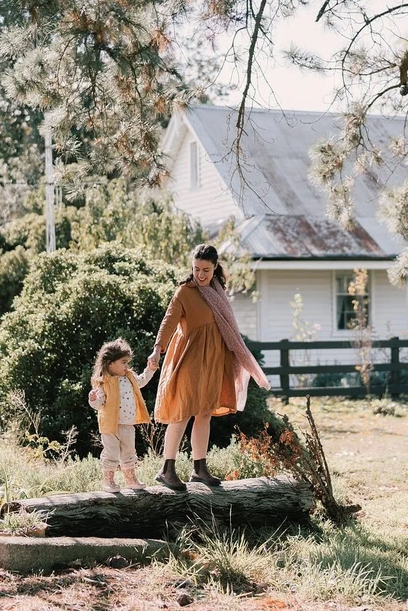 Family exploring the gardens and farm surrounds beyond Dunmore Farm