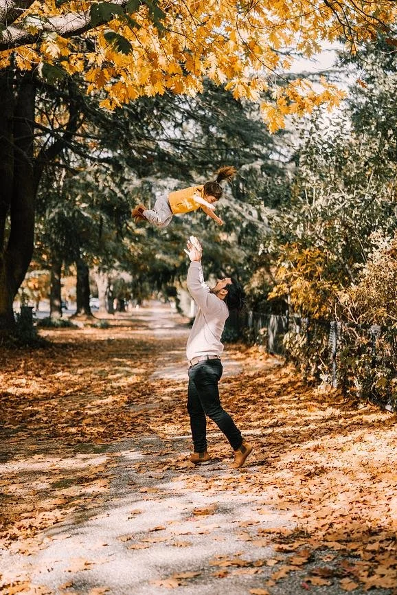 Family enjoying autumn leaves in Victoria’s High Country near Dunmore Farm