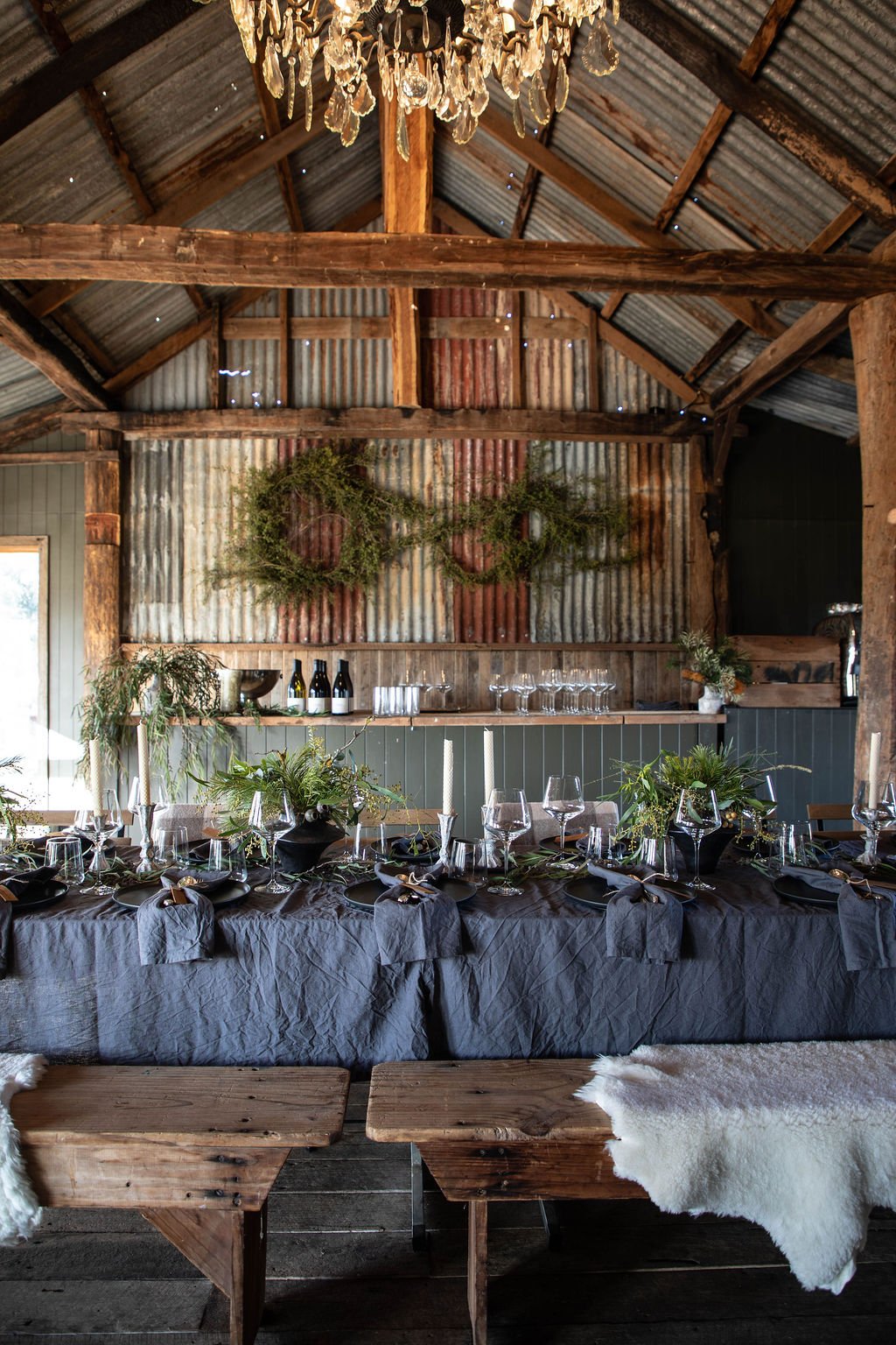 Long table dining set for a gathering inside the barn at Dunmore Farm in North East Victoria