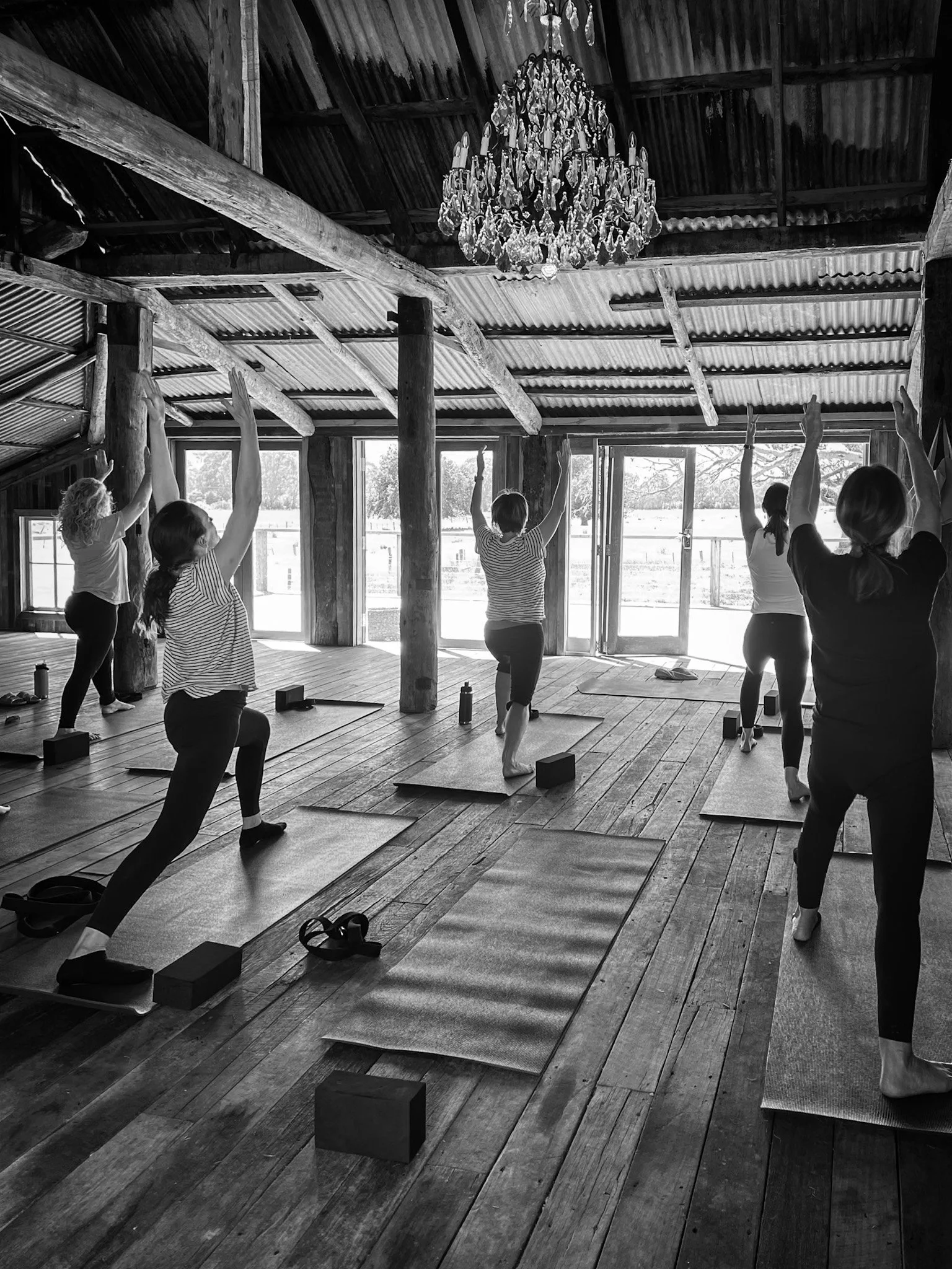 Yoga and mindfulness session inside the shearing shed at Dunmore Farm