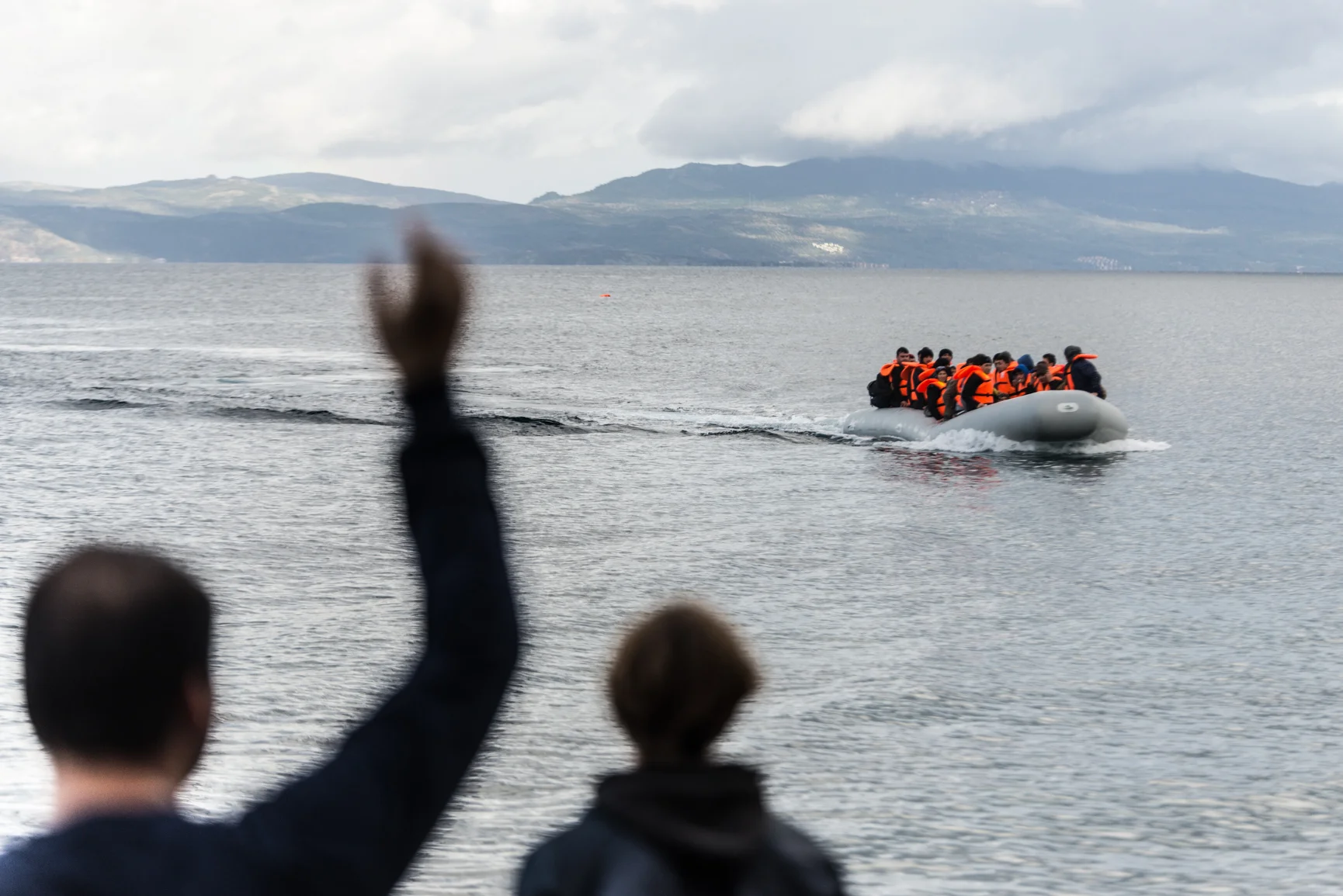 Refugee in a boat at lesvos coasts.JPG