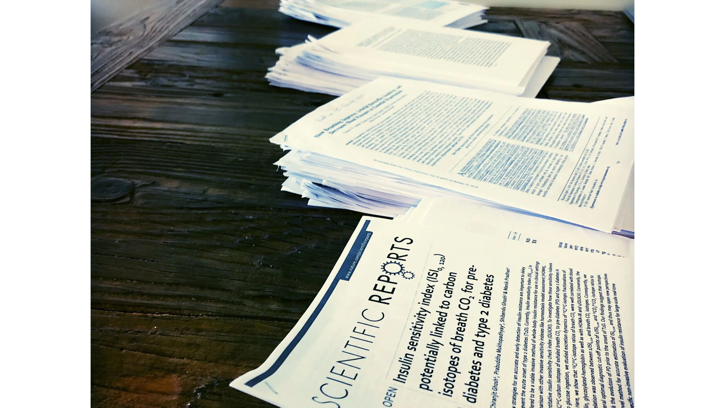 Papers_Stacked.jpg
