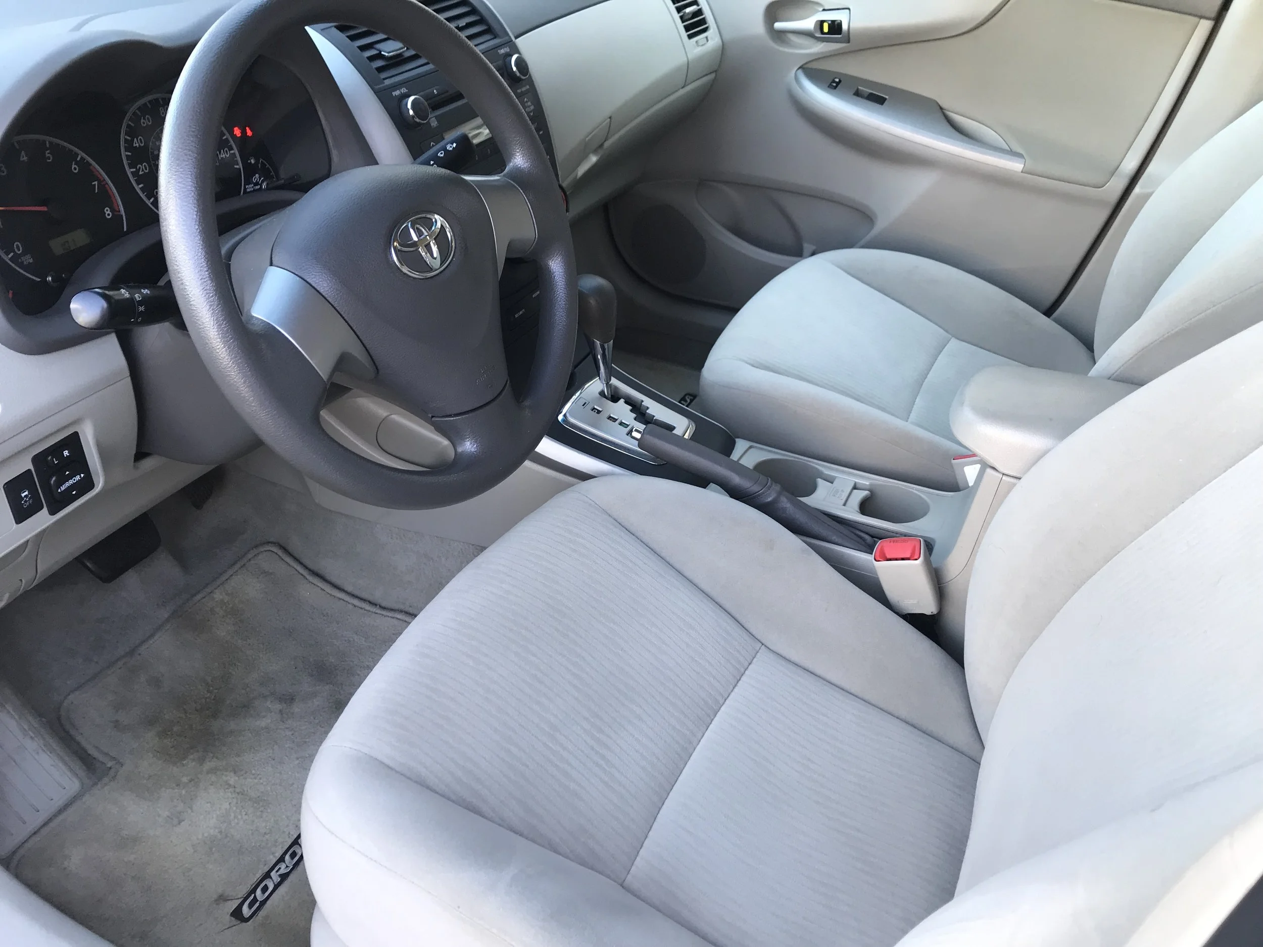 2010 White Corolla Front Seats.jpg