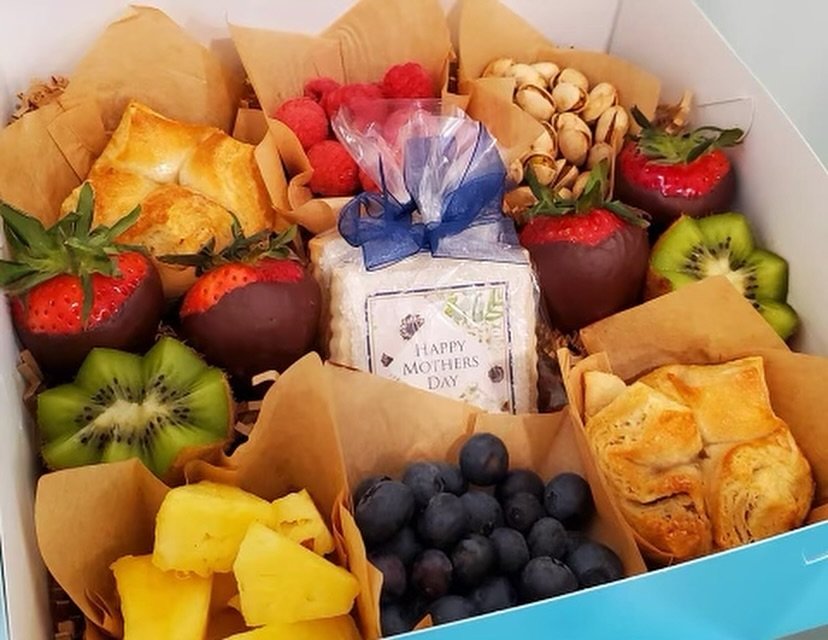 Our favorite Mother's Day Box is back!  Care of our favorite Kouign Amann baker Tif!  Inside you will find Kouign Amann, shortbread cookies, fruit, pistachios, chocolate covered Strawberries and a whole lotta love she's only whipping up 40, first com