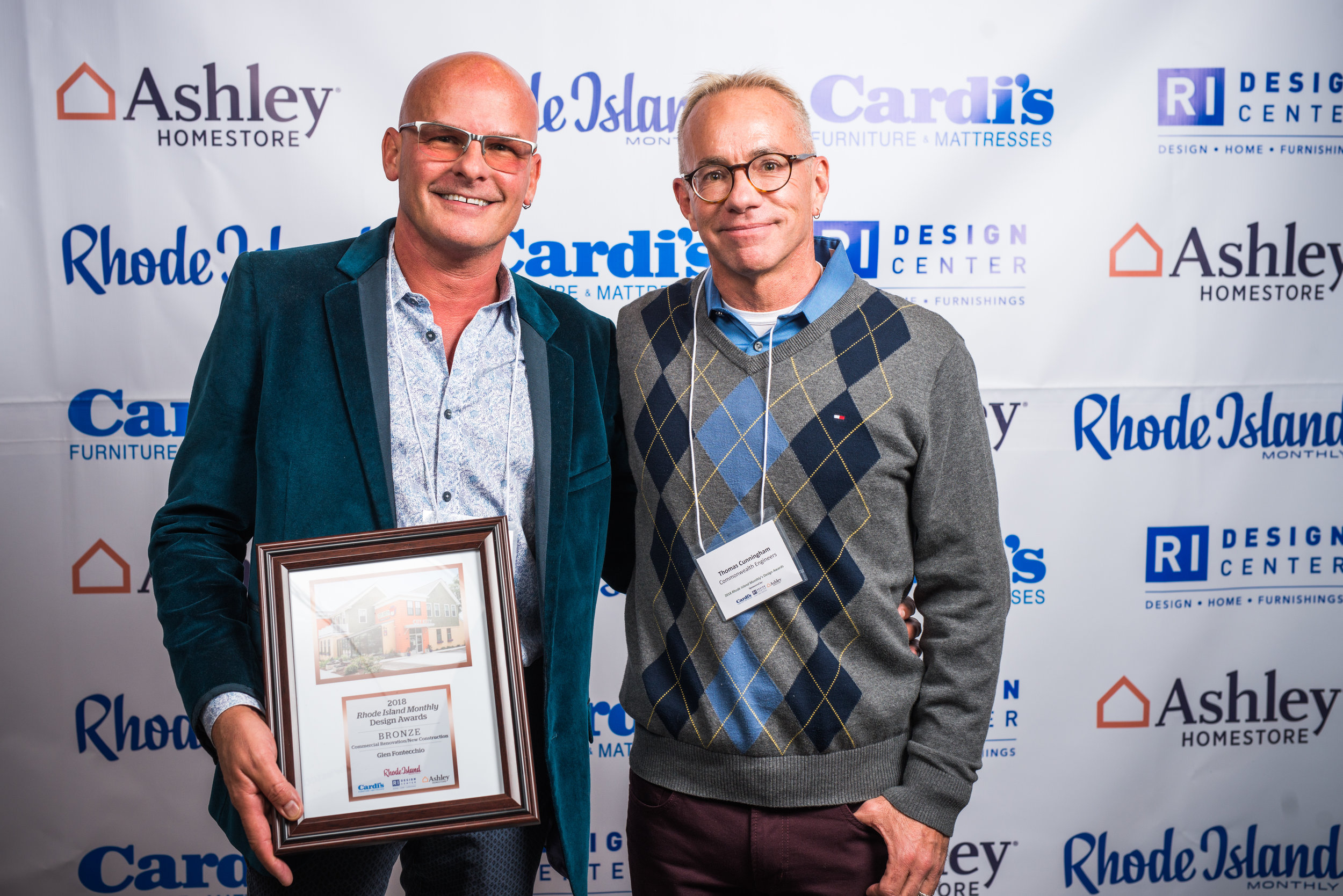 Mr. Fontecchio and his husband, Thom, accepting the design award for the new City Kitty