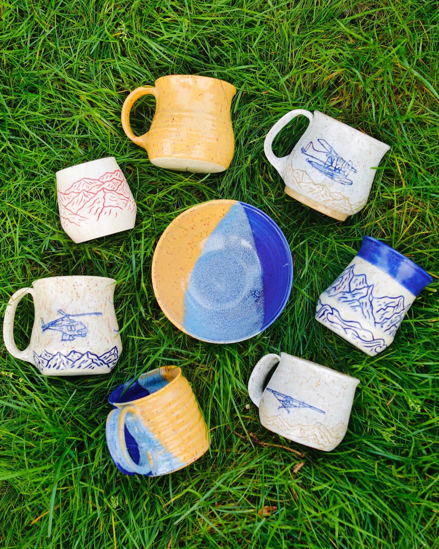 Thrilled to announce that I will be showcasing my latest work at The Pottery Jungle on First Friday - October 4th, from 4-8pm.
One of a kind mountain and aviation mugs, along with various yellow and blue favorites will be on display and on sale. 
Sto
