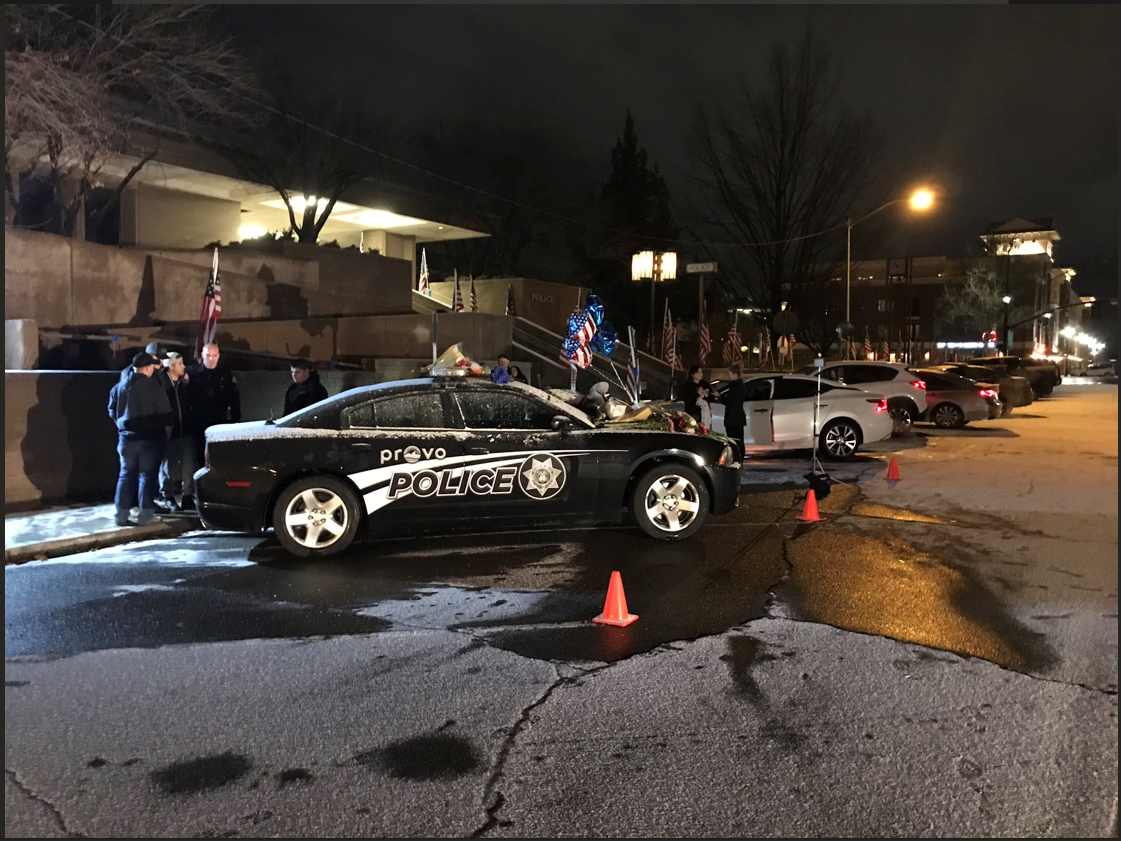 At the Provo Police Department Officer Shinners patrol car serves as a memorial. Coworkers are stopping by to pay respects and reflect on his sacrifice. @abc4utah