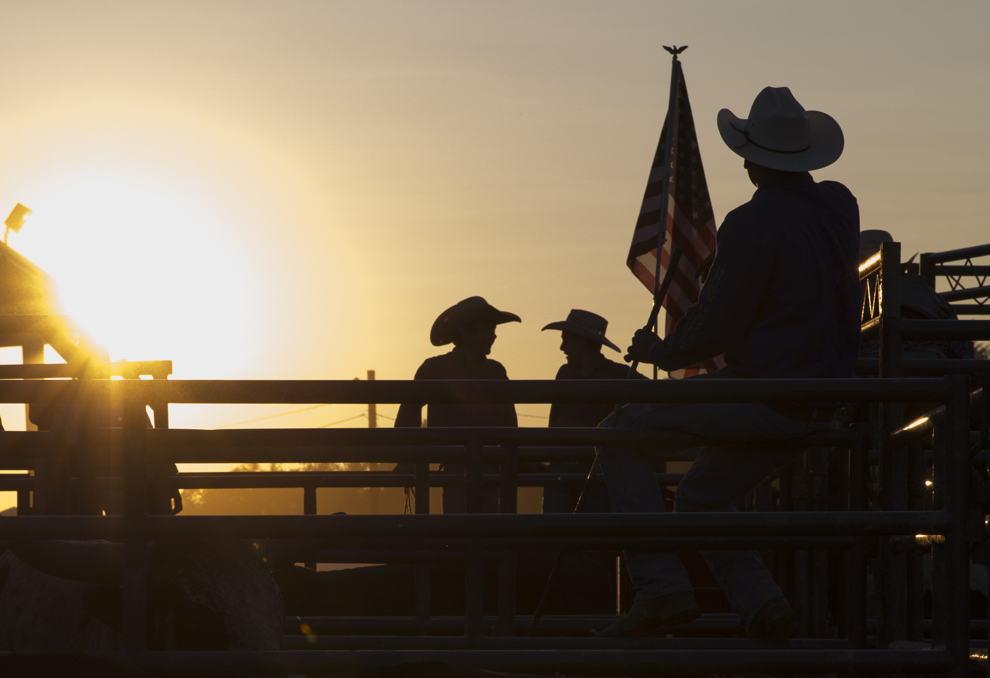  Cowboys await for opening ceremonies to begin at the annual Boys and Bulls Rodeo held at the Fayette County Fair near dusk on August 3, 2017. 