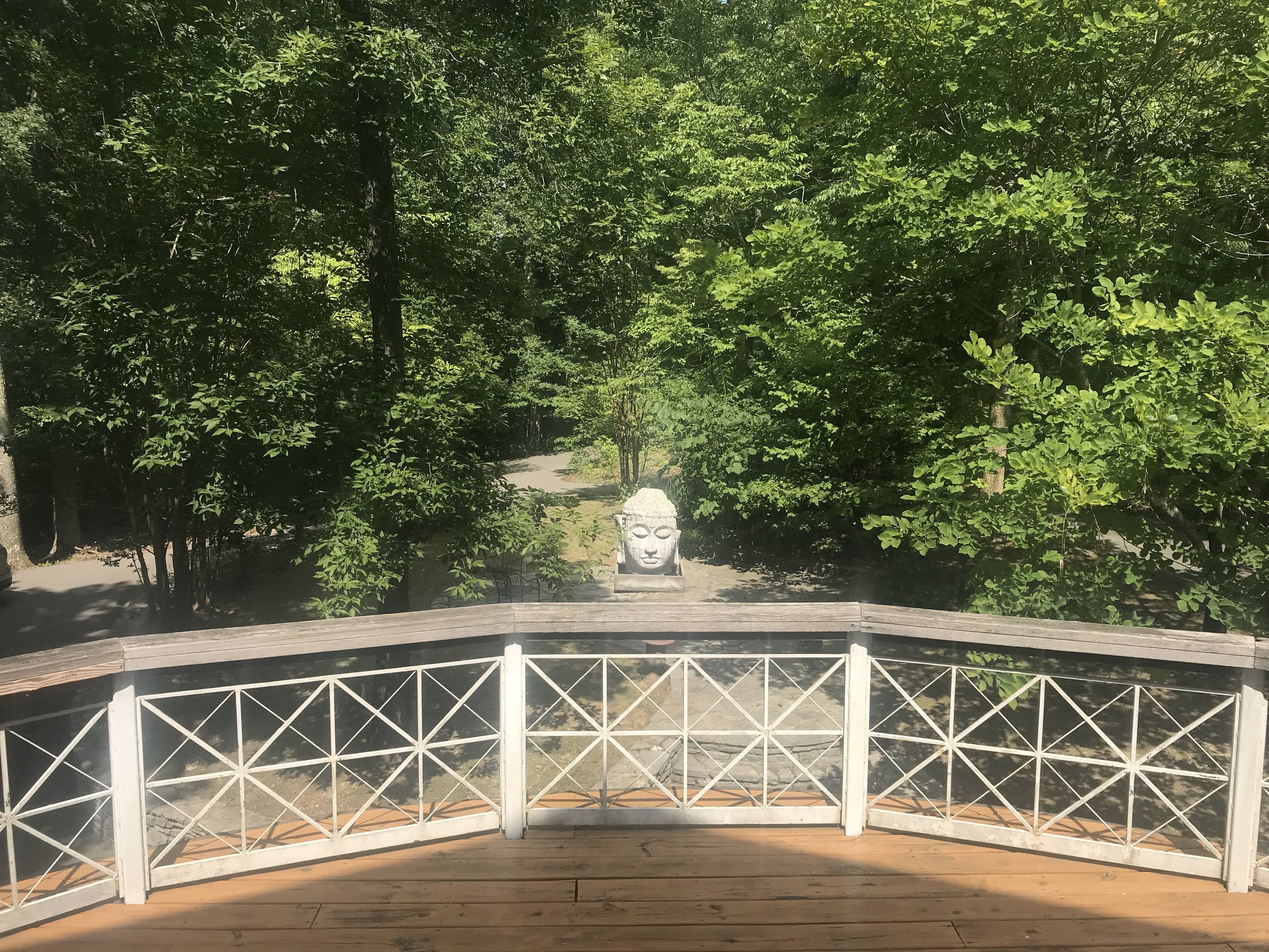 M OS Buddha head from upper porch.JPG